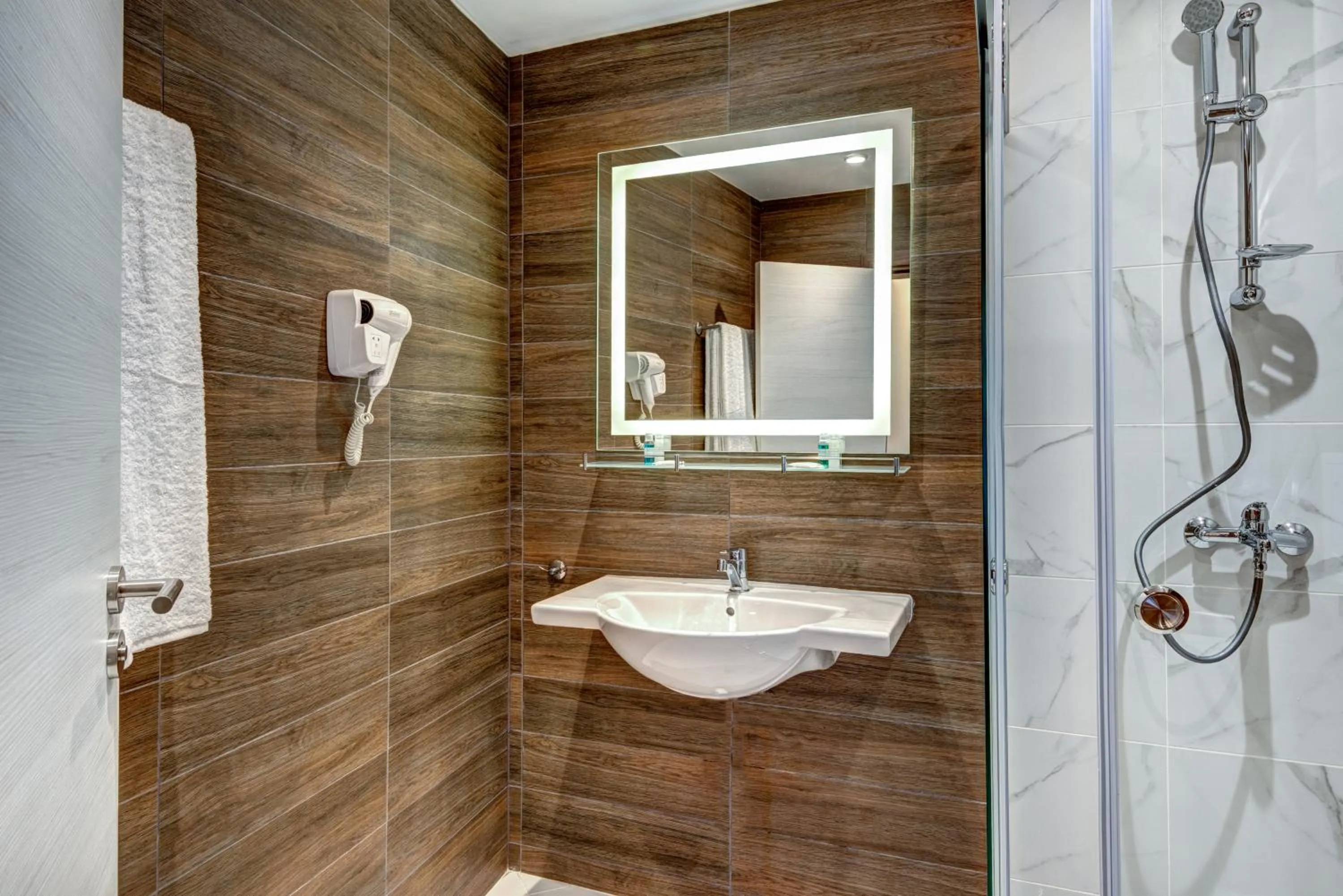 Bathroom in Panorama Blue Family Hotel and Free parking