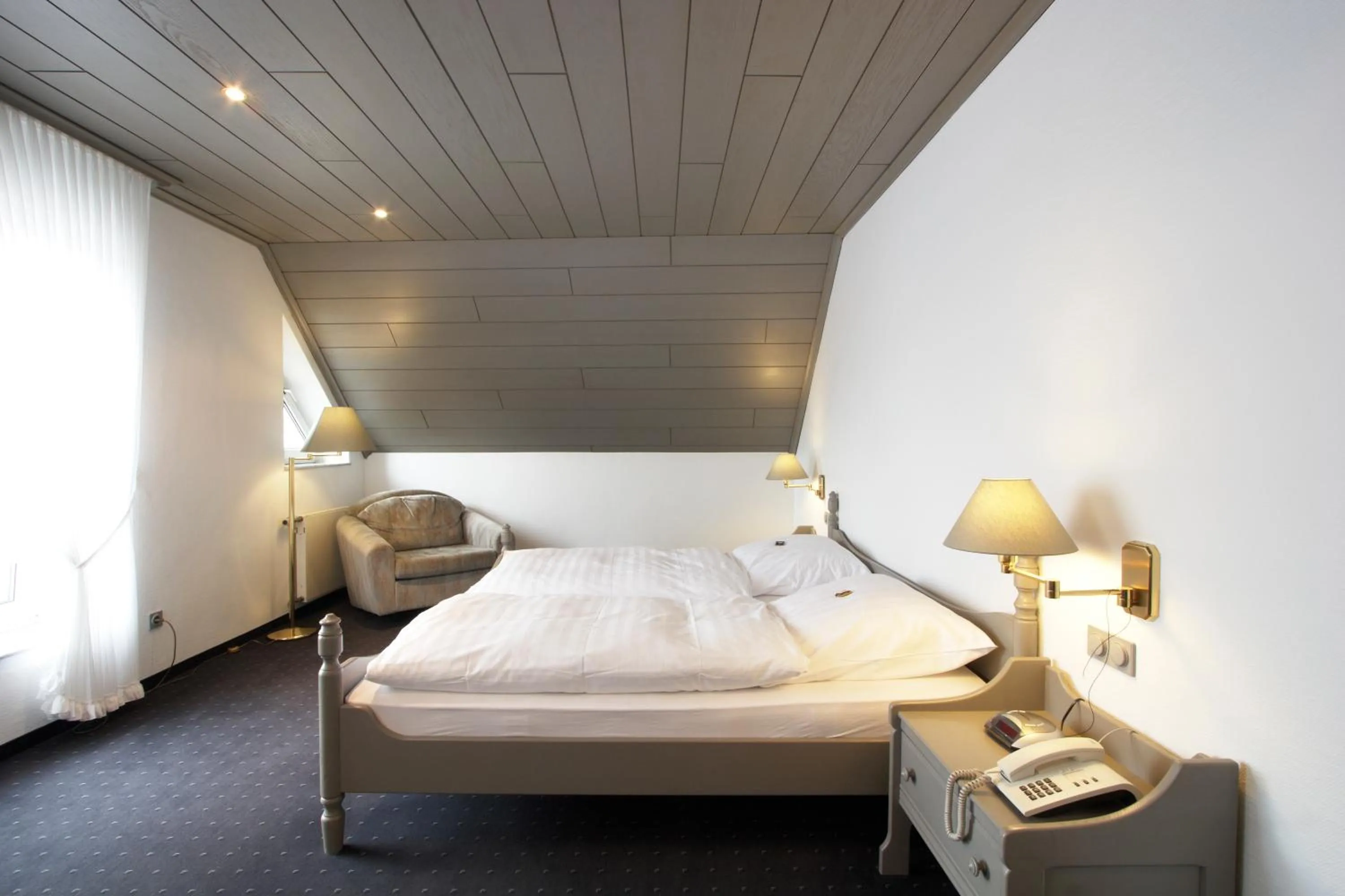 Photo of the whole room, Bed in Hotel Goldener Stern