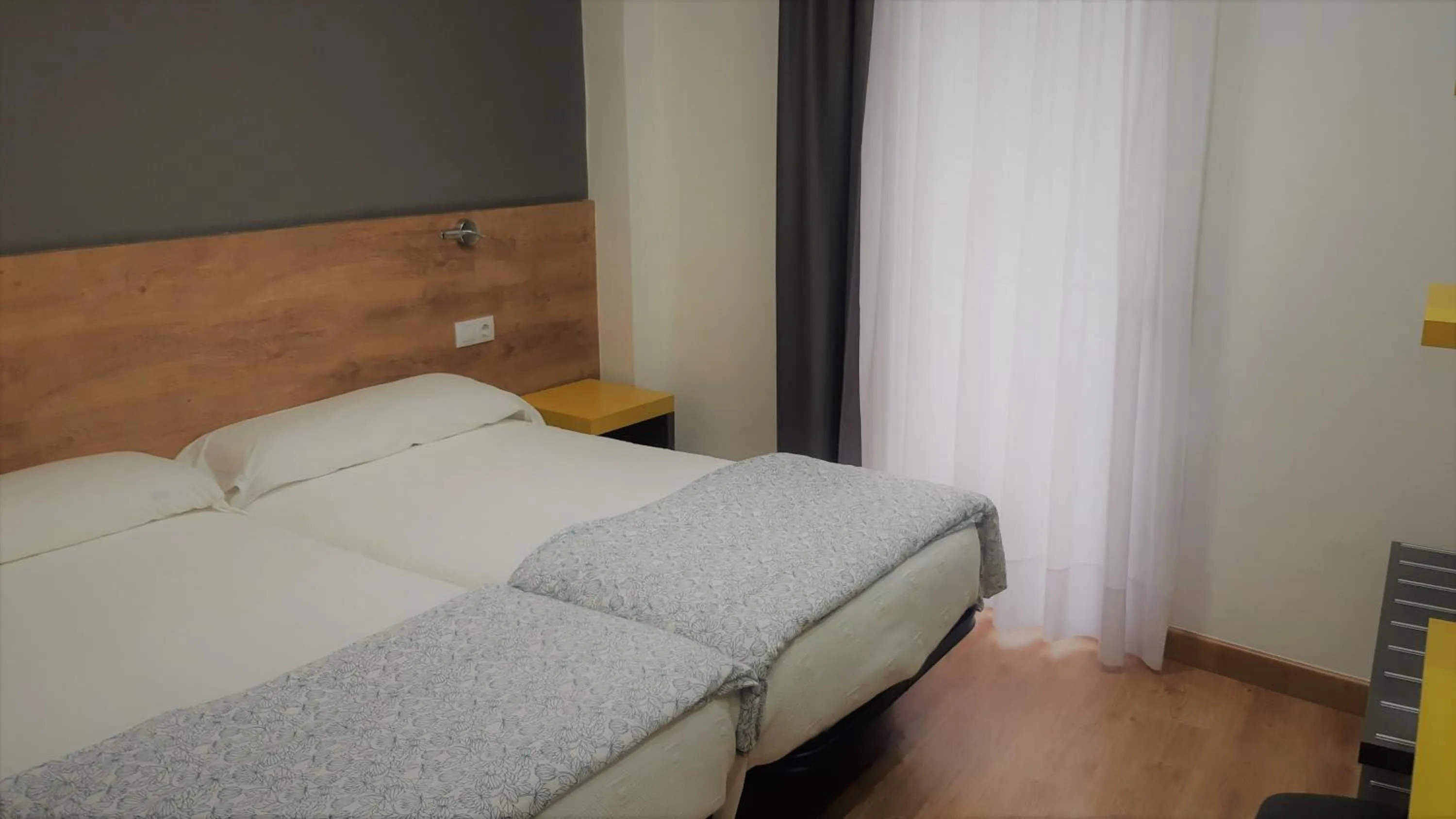 Bed in Hostal-Restaurante LUGANO