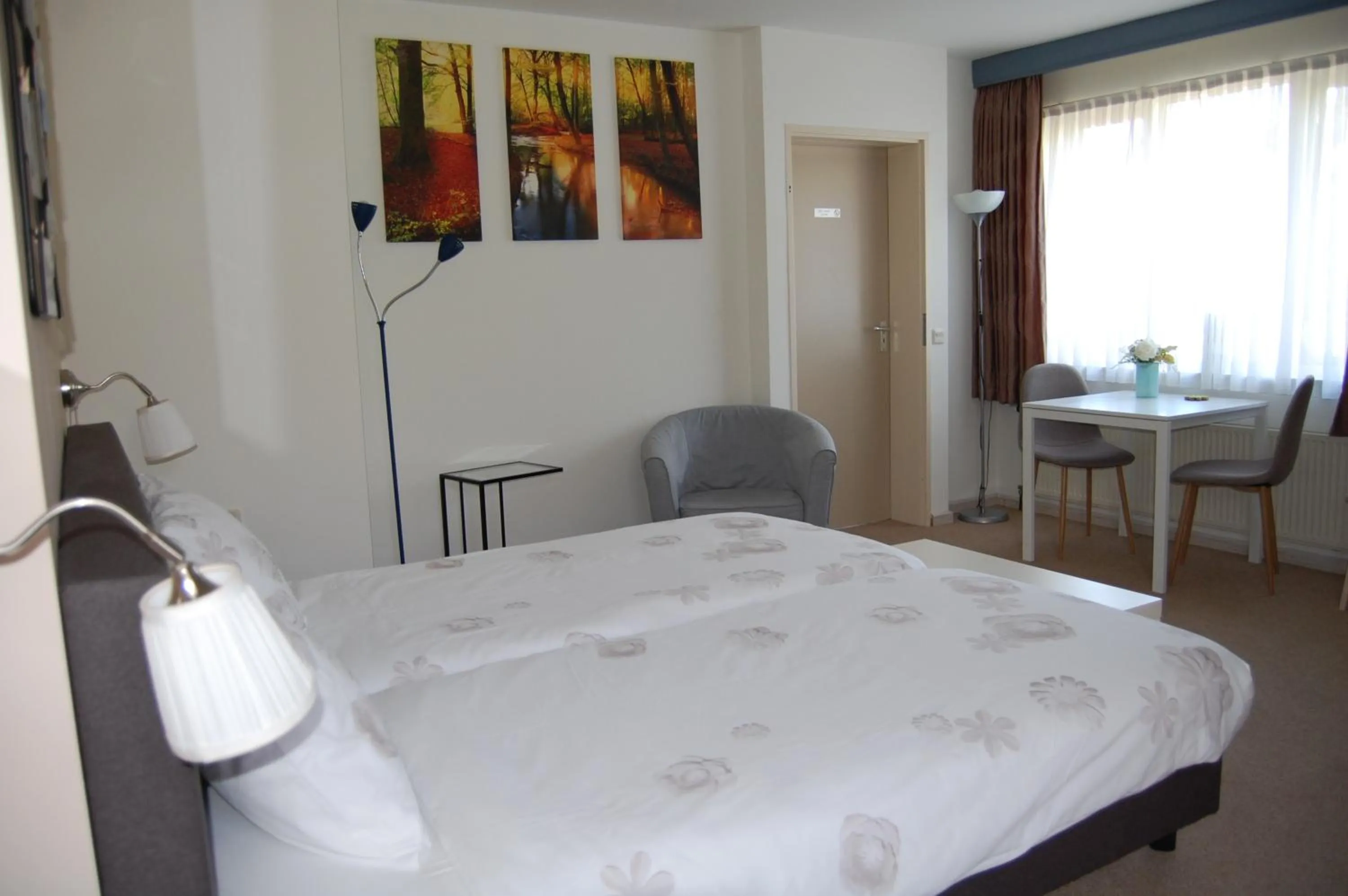 Seating area, Bed in B&B Gamerenwaard