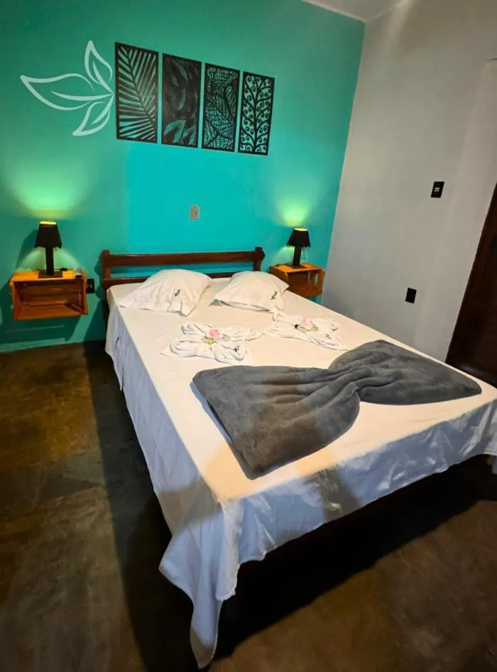 Bed in POUSADA NATIVA