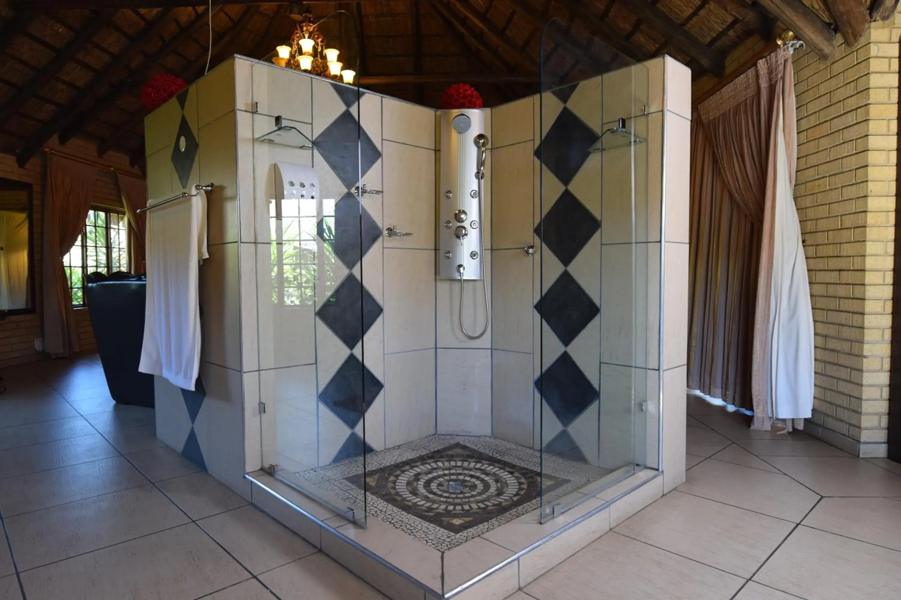 Shower in Thabong Bed and Breakfast Shower in Thabong Bed and Breakfast