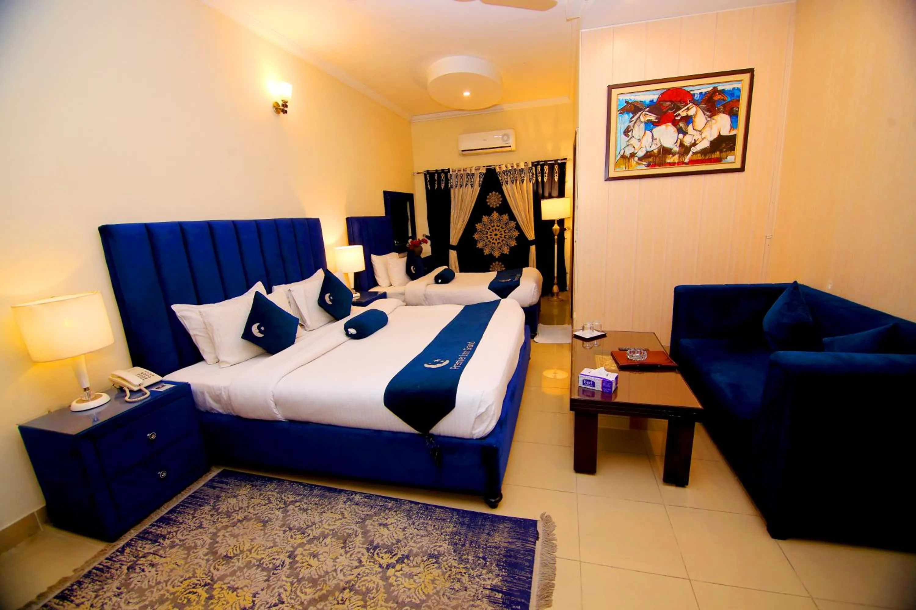 Bedroom in Premier Inn Grand Gulberg Lahore