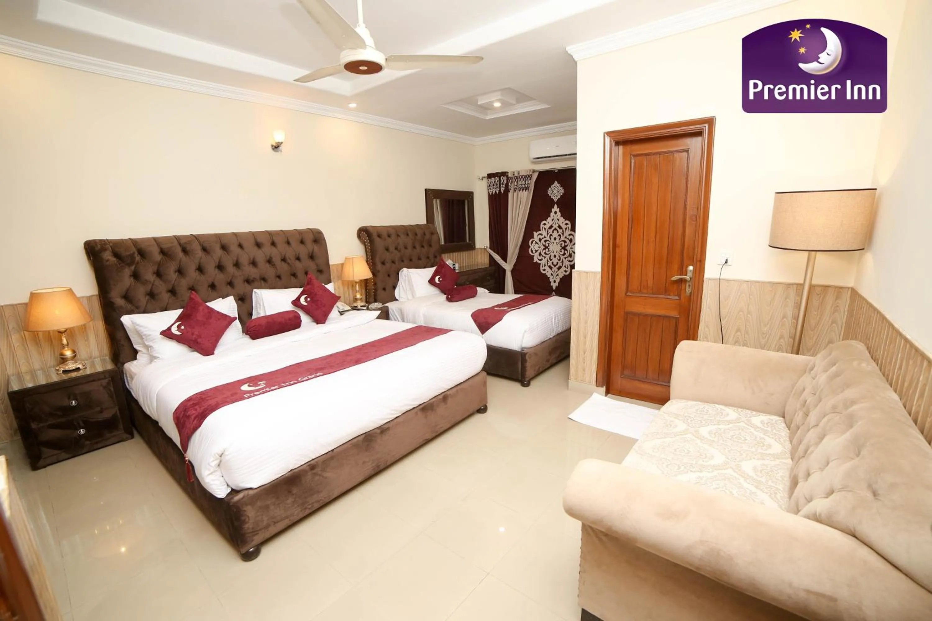 Photo of the whole room, Bed in Premier Inn Grand Gulberg Lahore