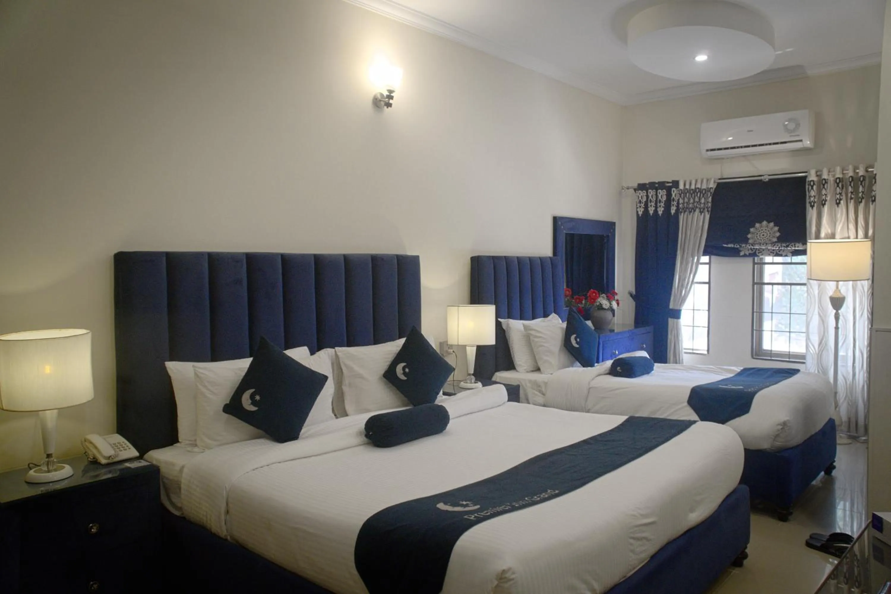 Photo of the whole room, Bed in Premier Inn Grand Gulberg Lahore