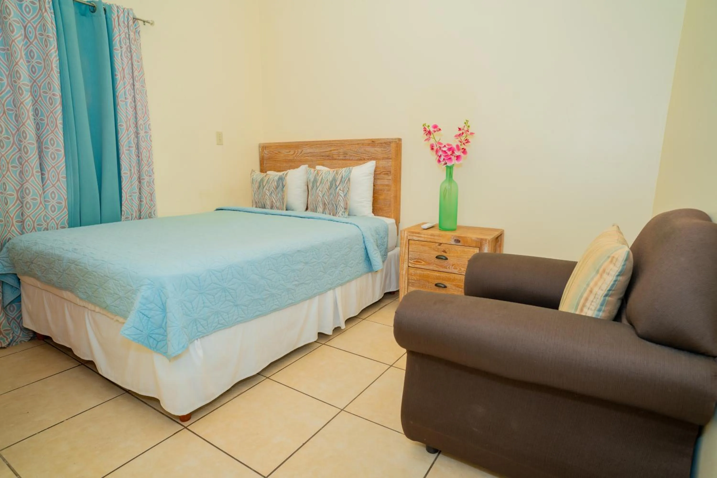 Bed in Connie's Comfort Suites