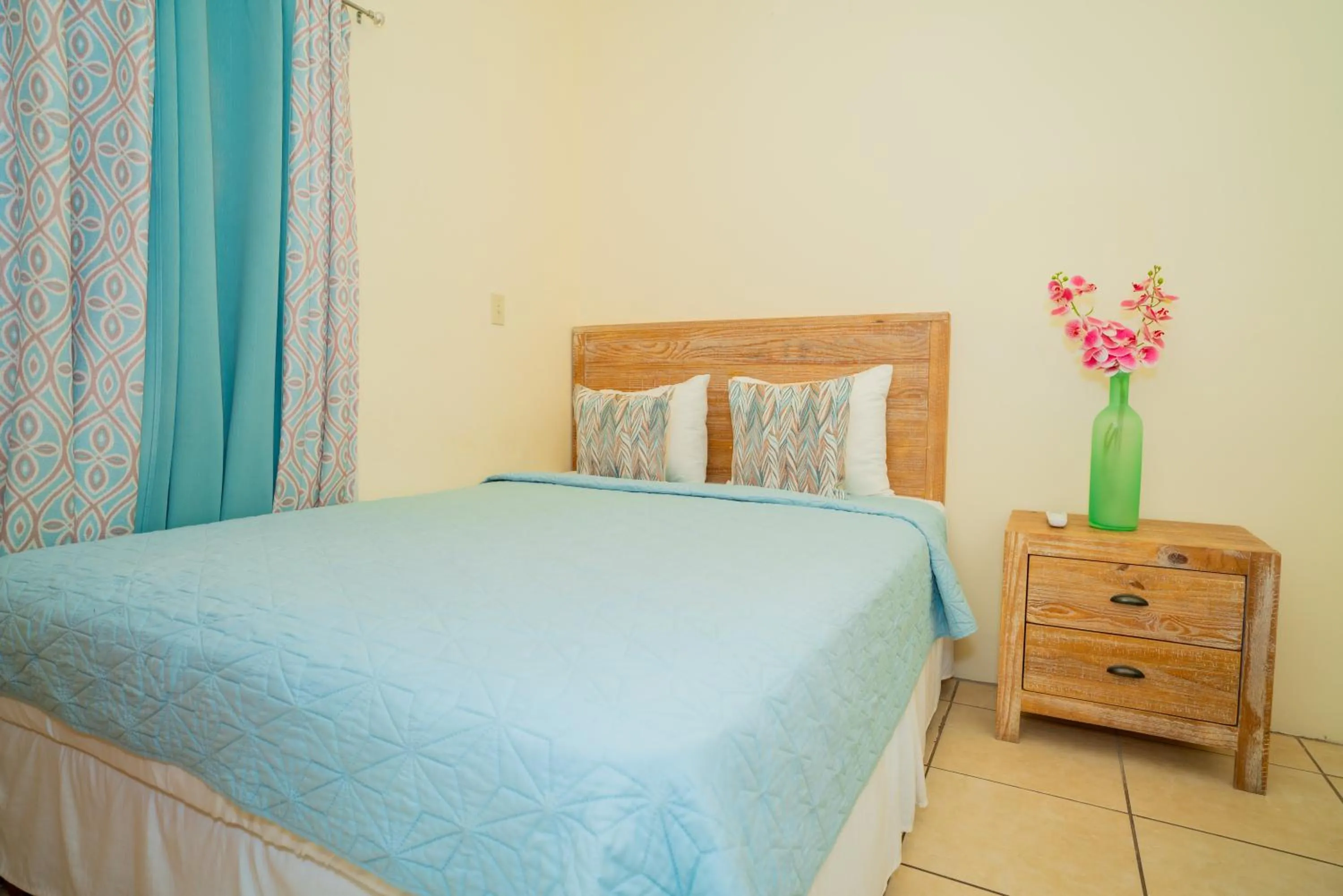 Bed in Connie's Comfort Suites