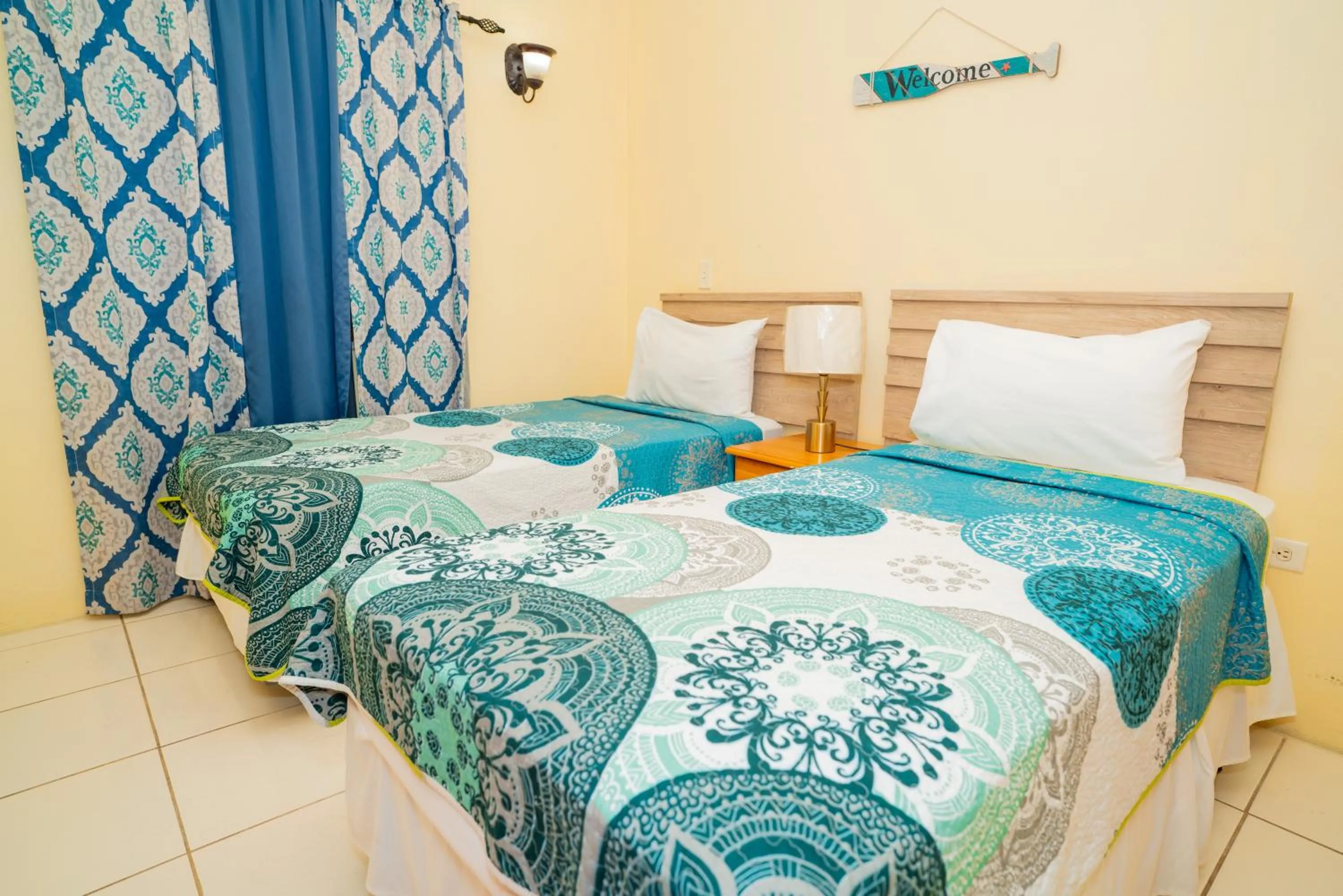 Bed in Connie's Comfort Suites