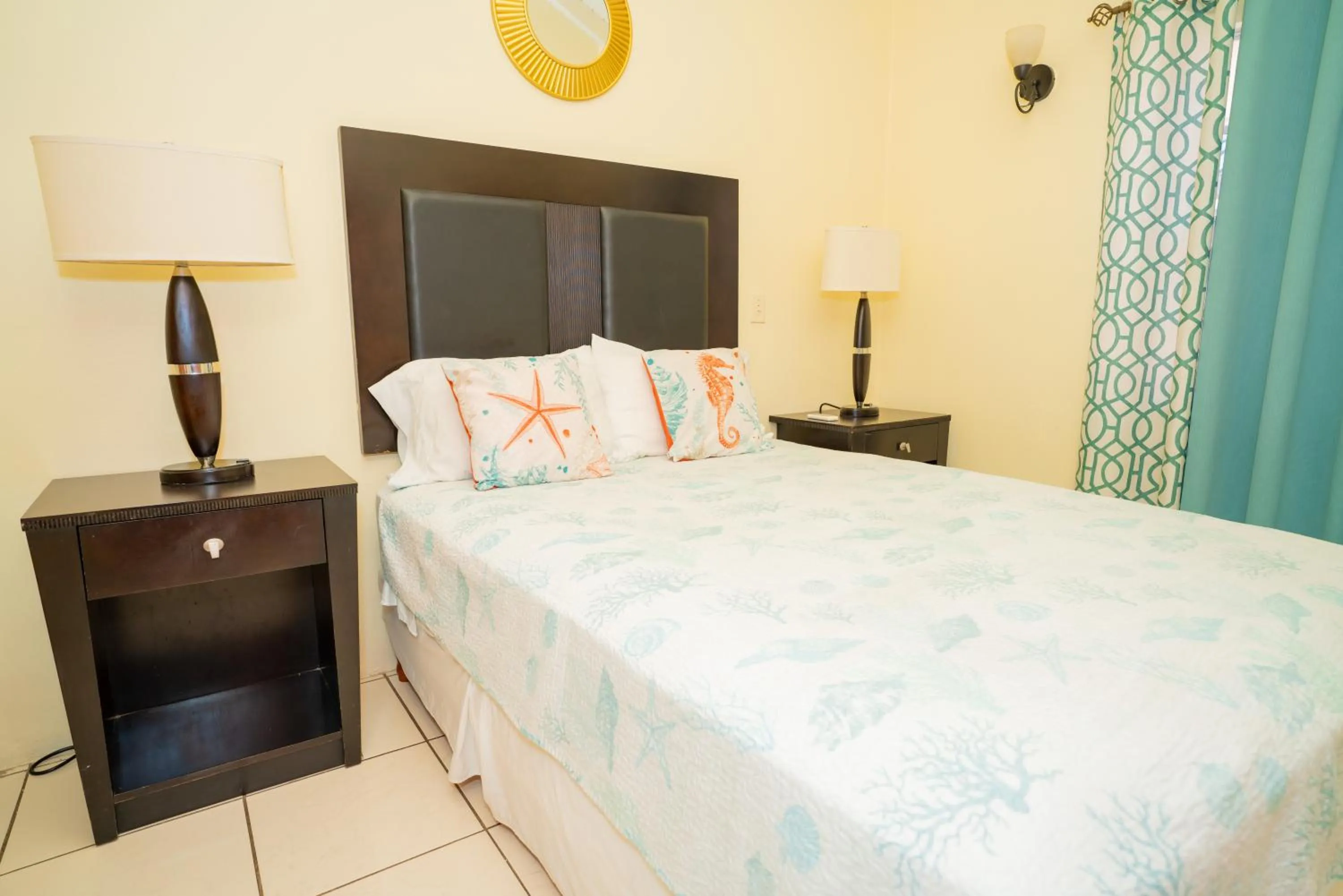 Bed in Connie's Comfort Suites