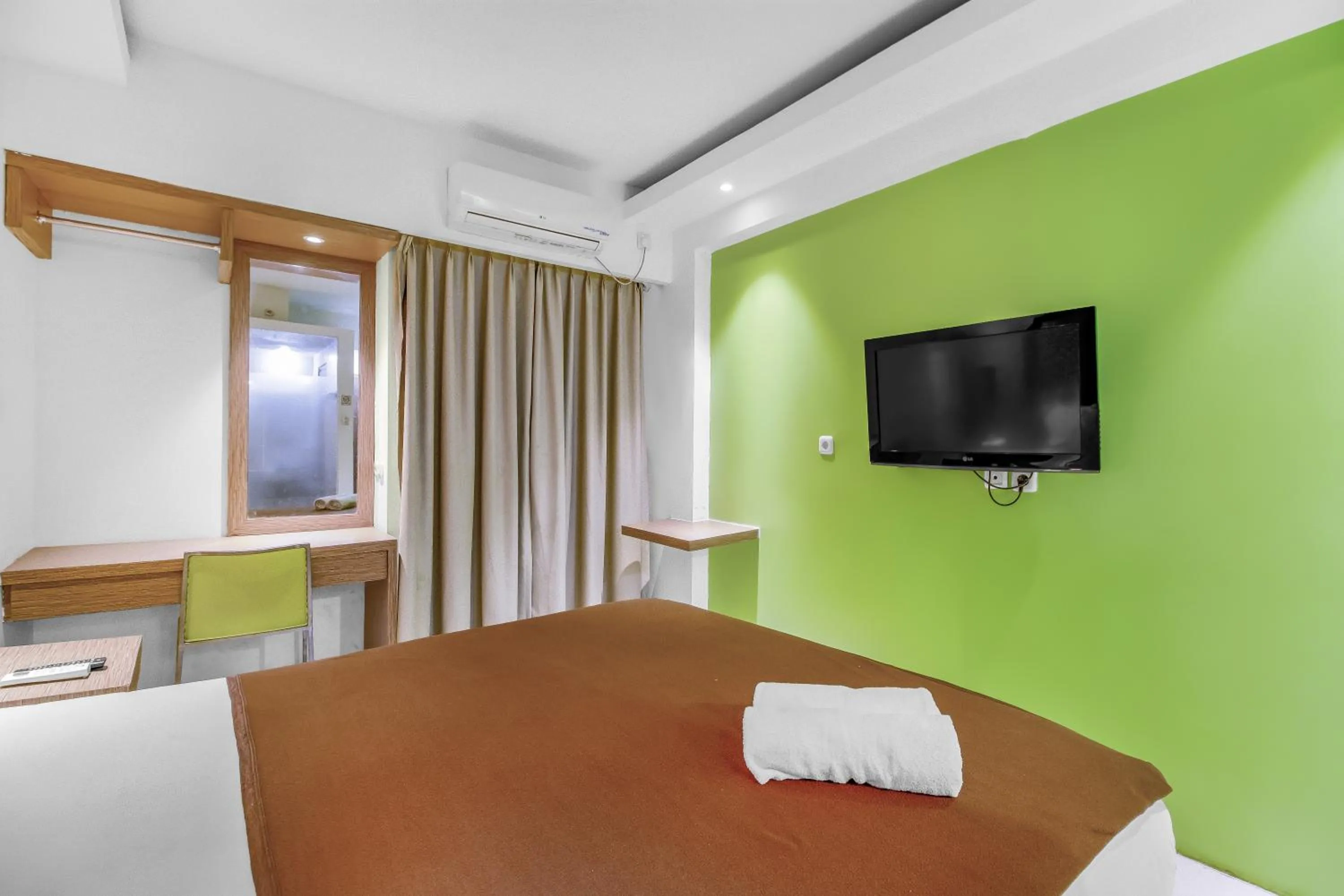 TV and multimedia, Bed in Skyland Bogor Valley Apartments