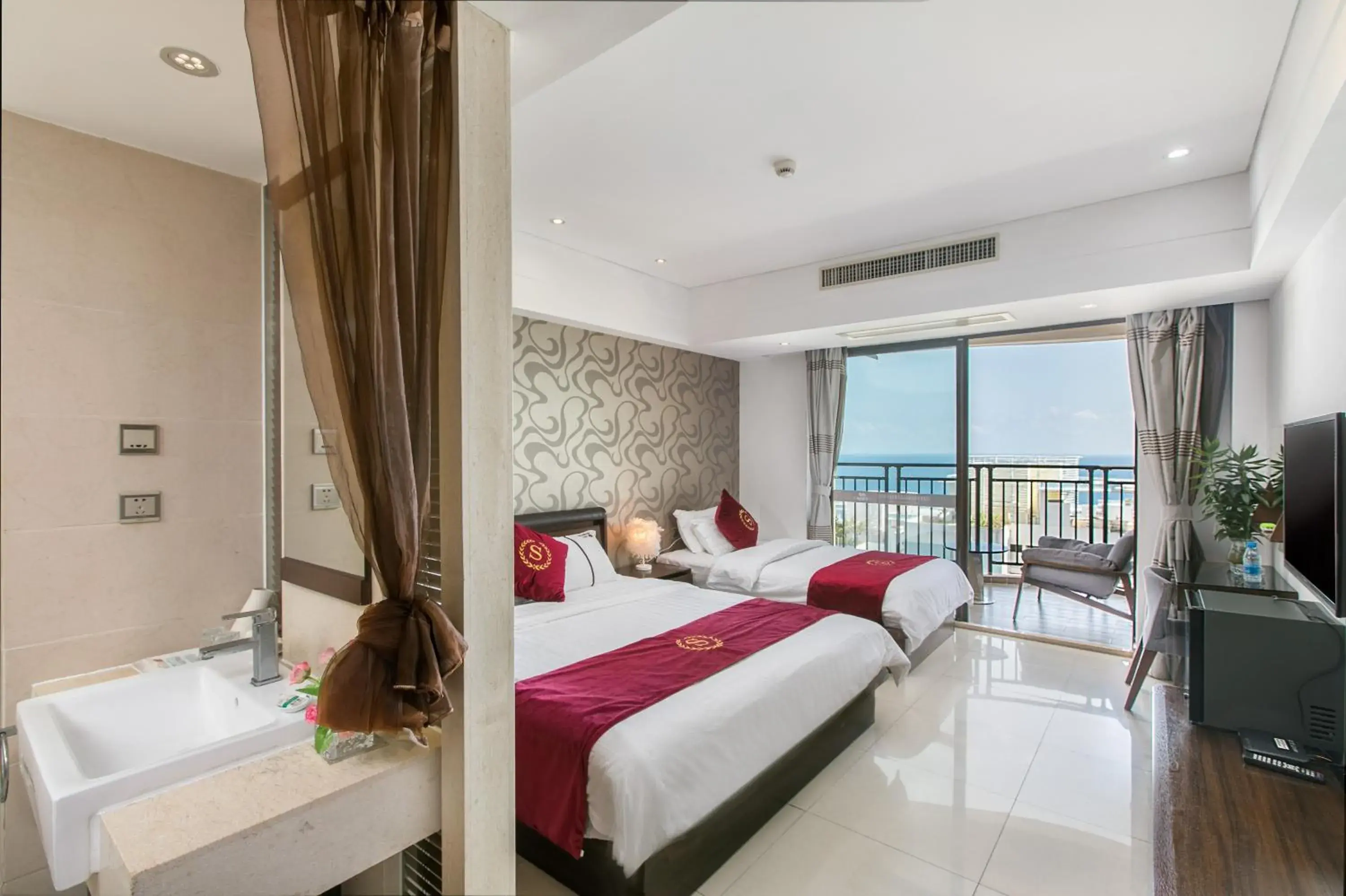 Family Room in Sanya Sun and Sea Gueshouse Family Room in Sanya Sun and Sea Gueshouse