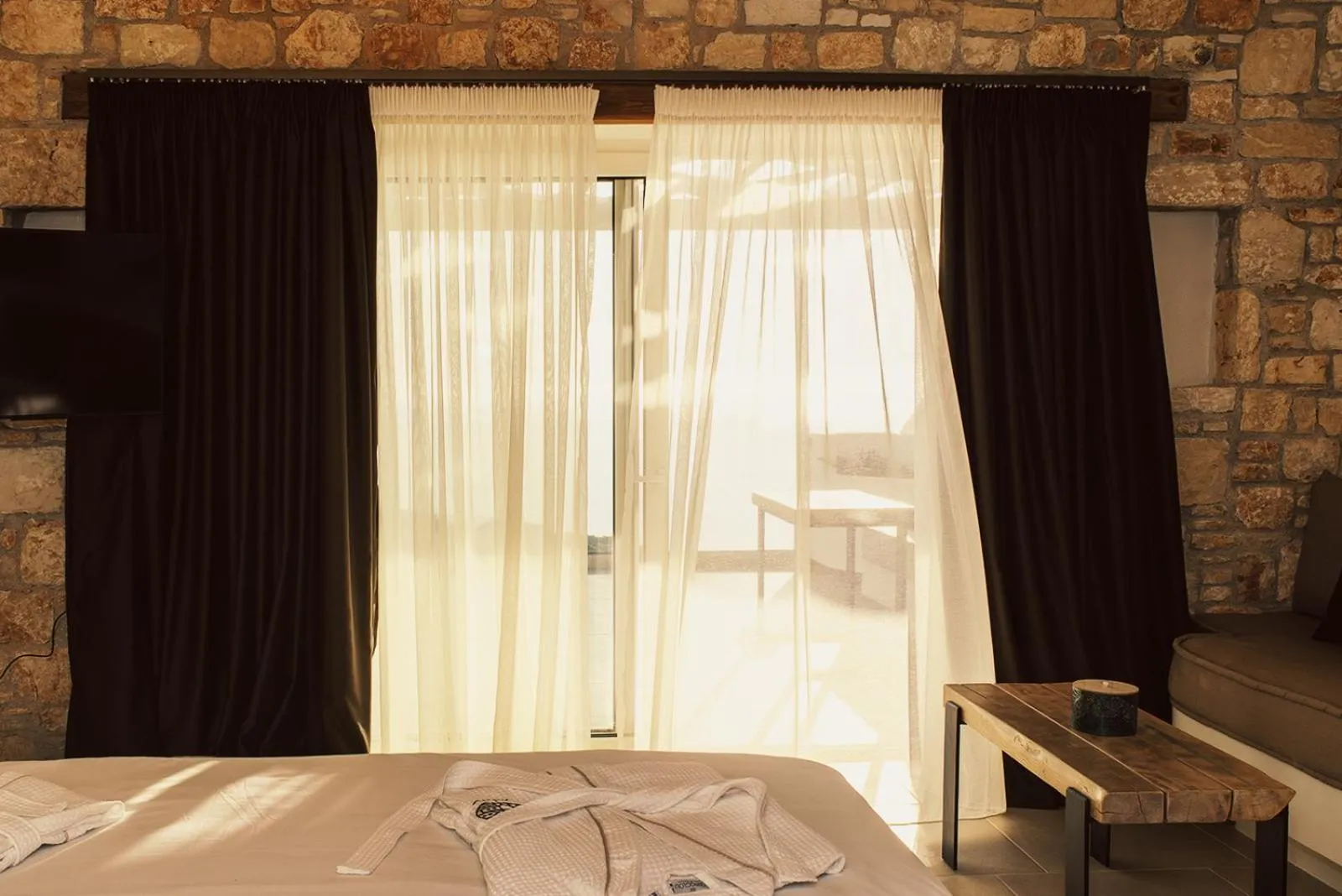 Bedroom in Aliv stone suites & spa