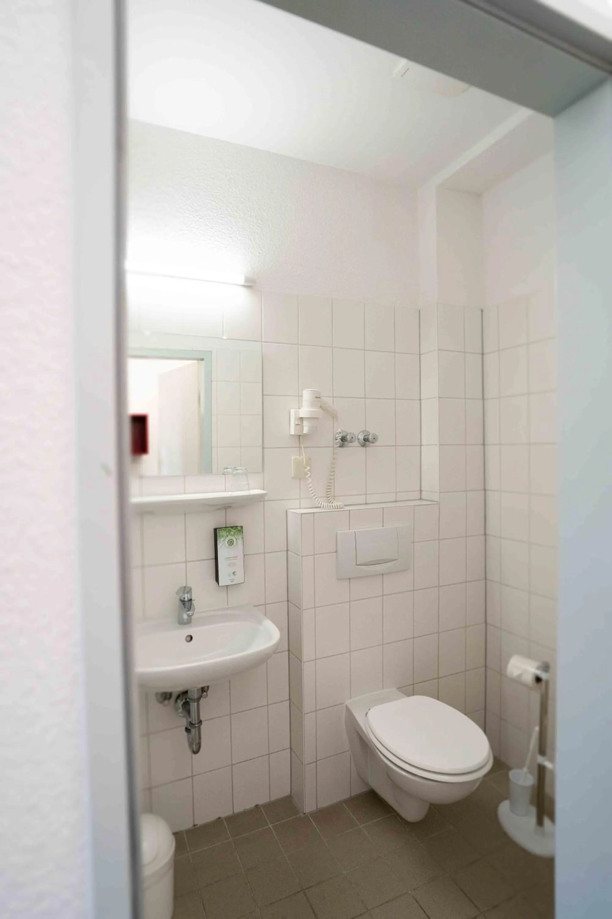 Bathroom in Plaza Inn Hannover City Nord