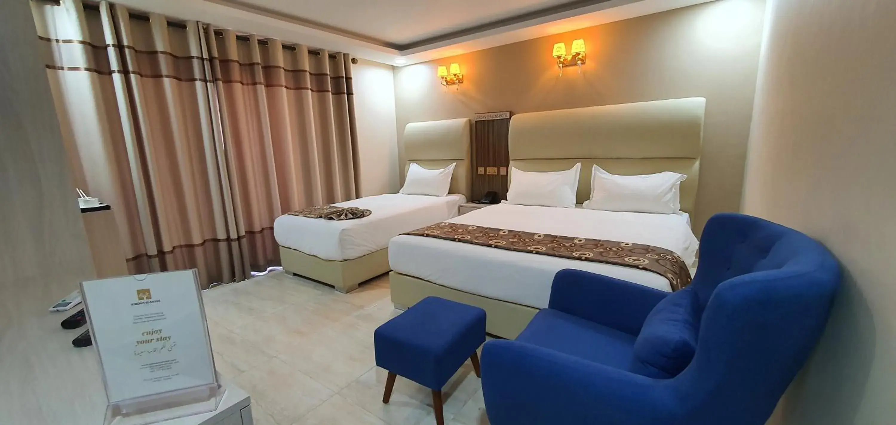 Shower, Bed in Jordan Seasons Hotel Shower, Bed in Jordan Seasons Hotel