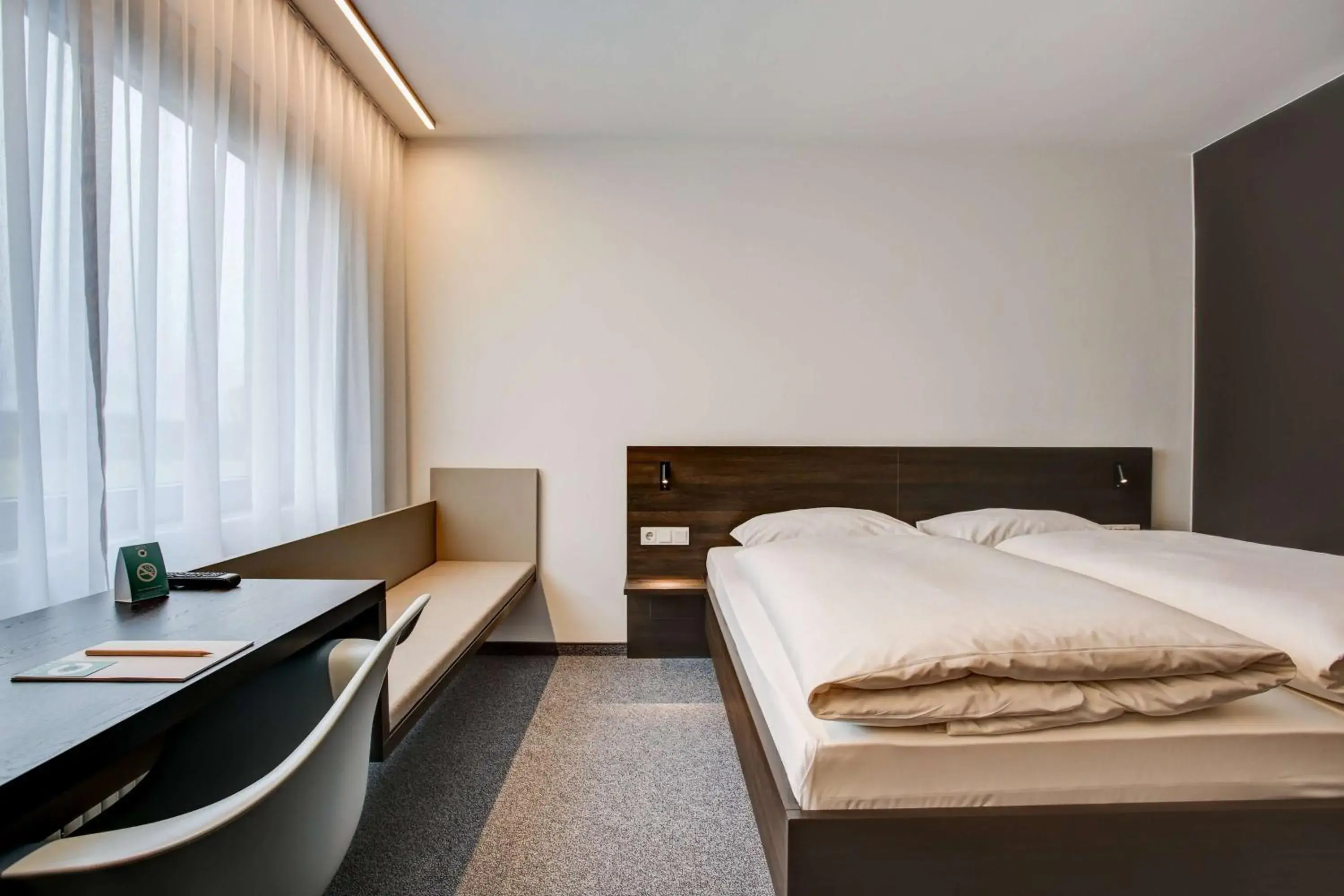 Photo of the whole room, Bed in Centro Park Hotel Stuttgart, Trademark Collection by Wyndham Photo of the whole room, Bed in Centro Park Hotel Stuttgart, Trademark Collection by Wyndham