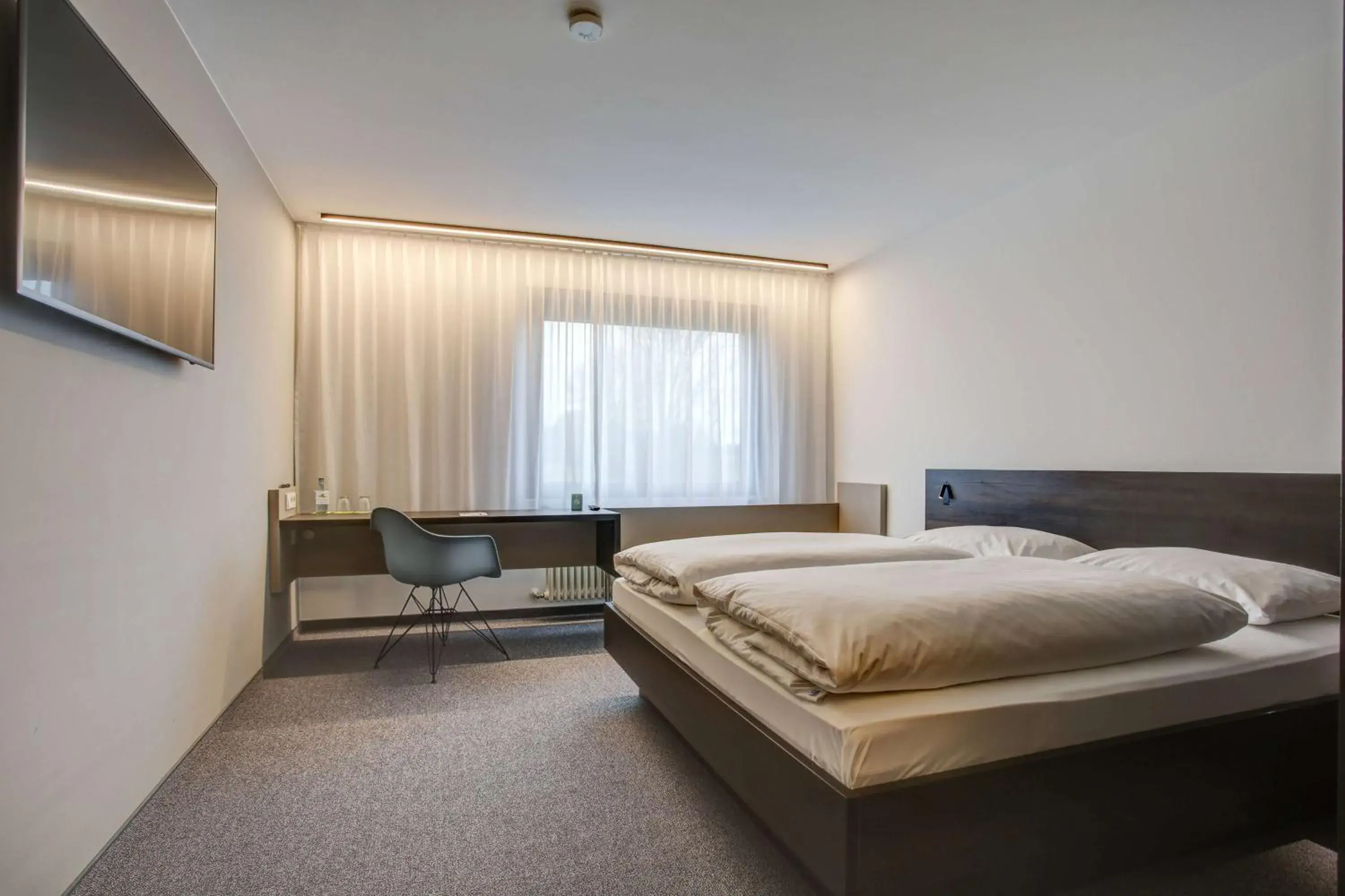 Photo of the whole room, Bed in Centro Park Hotel Stuttgart, Trademark Collection by Wyndham Photo of the whole room, Bed in Centro Park Hotel Stuttgart, Trademark Collection by Wyndham