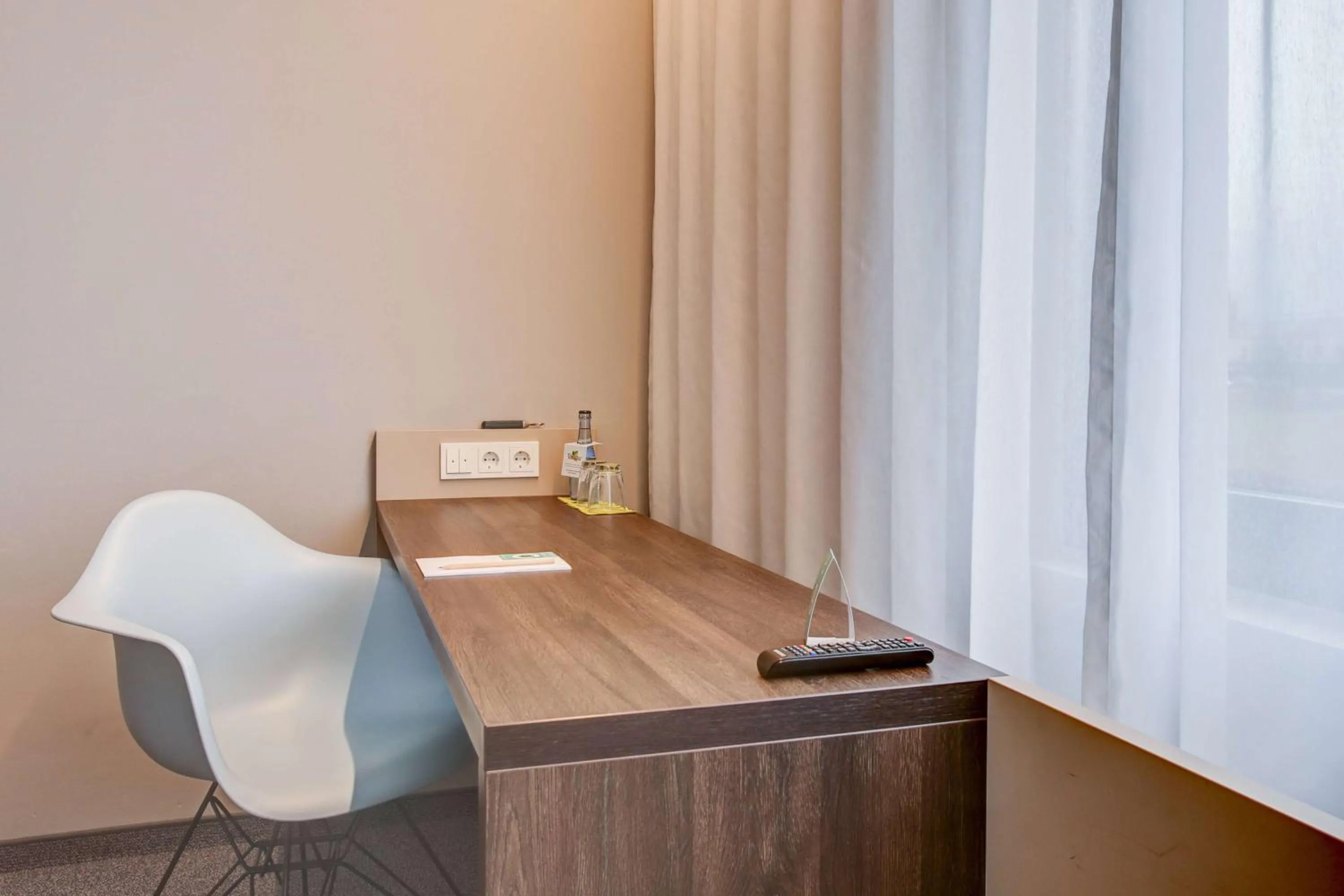 Photo of the whole room in Centro Park Hotel Stuttgart, Trademark Collection by Wyndham