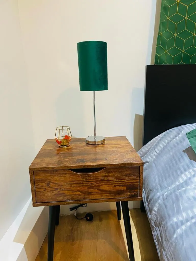 Bed in London Luxury Apartment with Private Jacuzzi Hot tub & Sauna