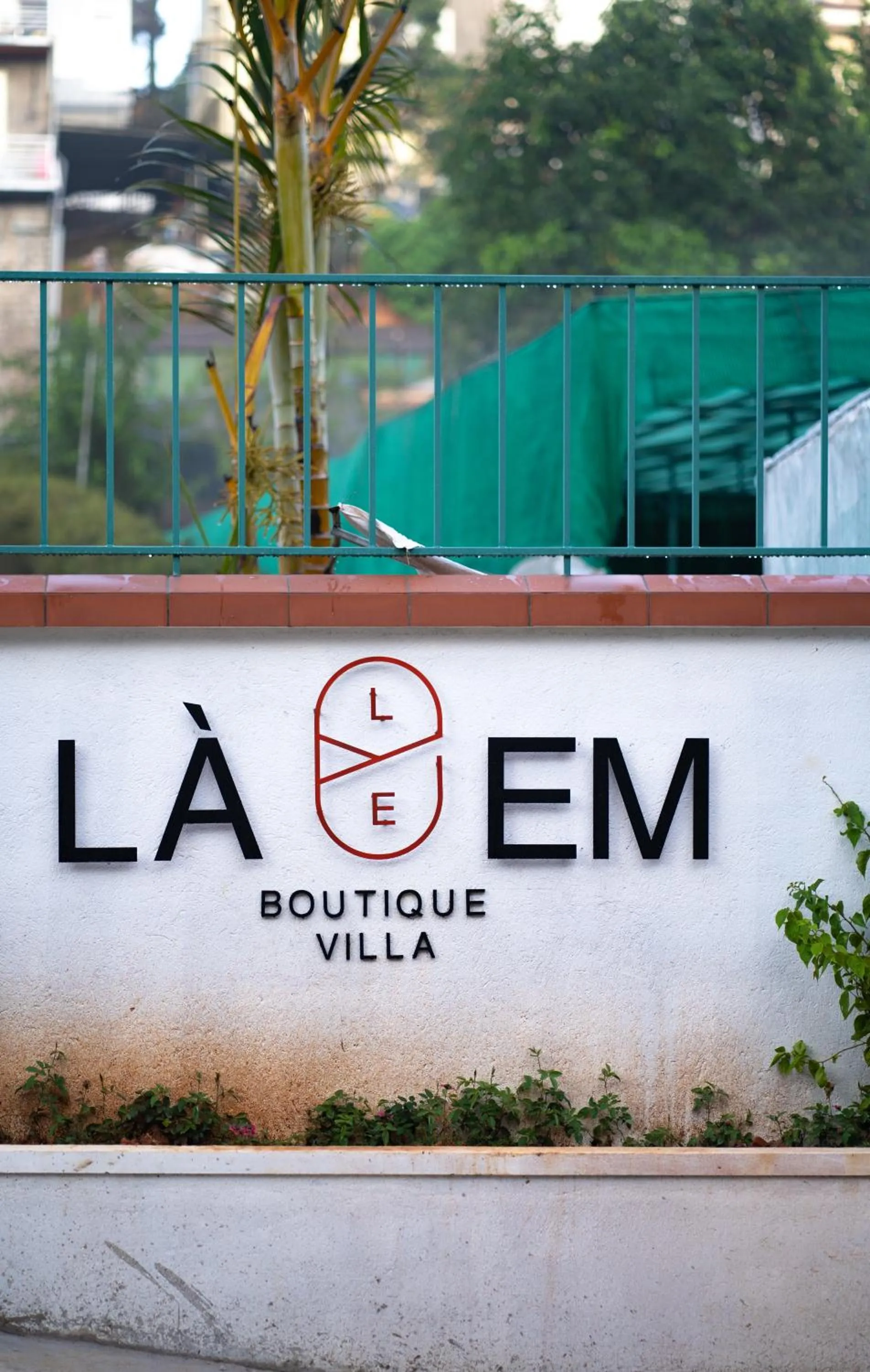 Property logo or sign in La Em Boutique Villa