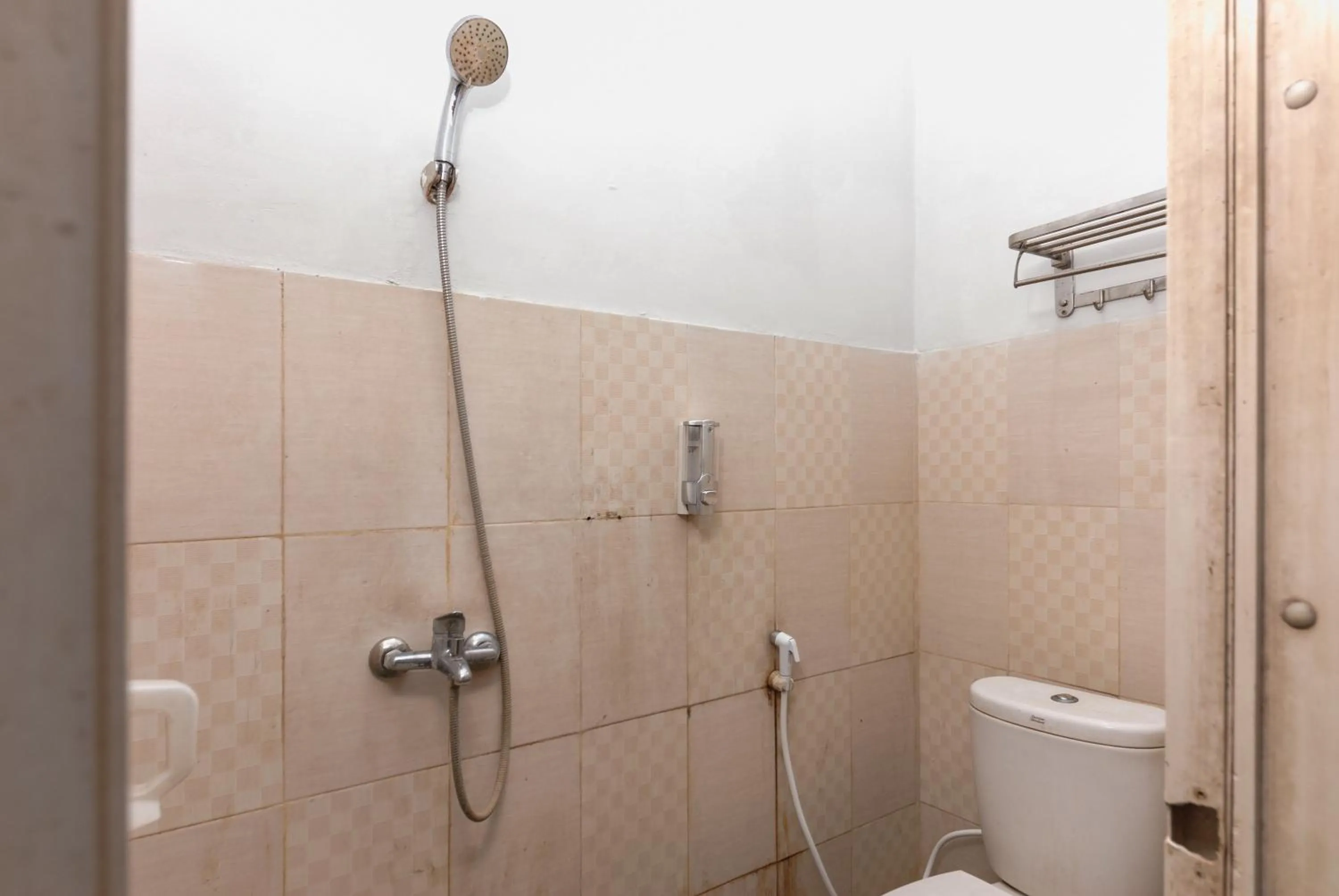 Bedroom in RedDoorz near Mandaya Royal Hospital Puri
