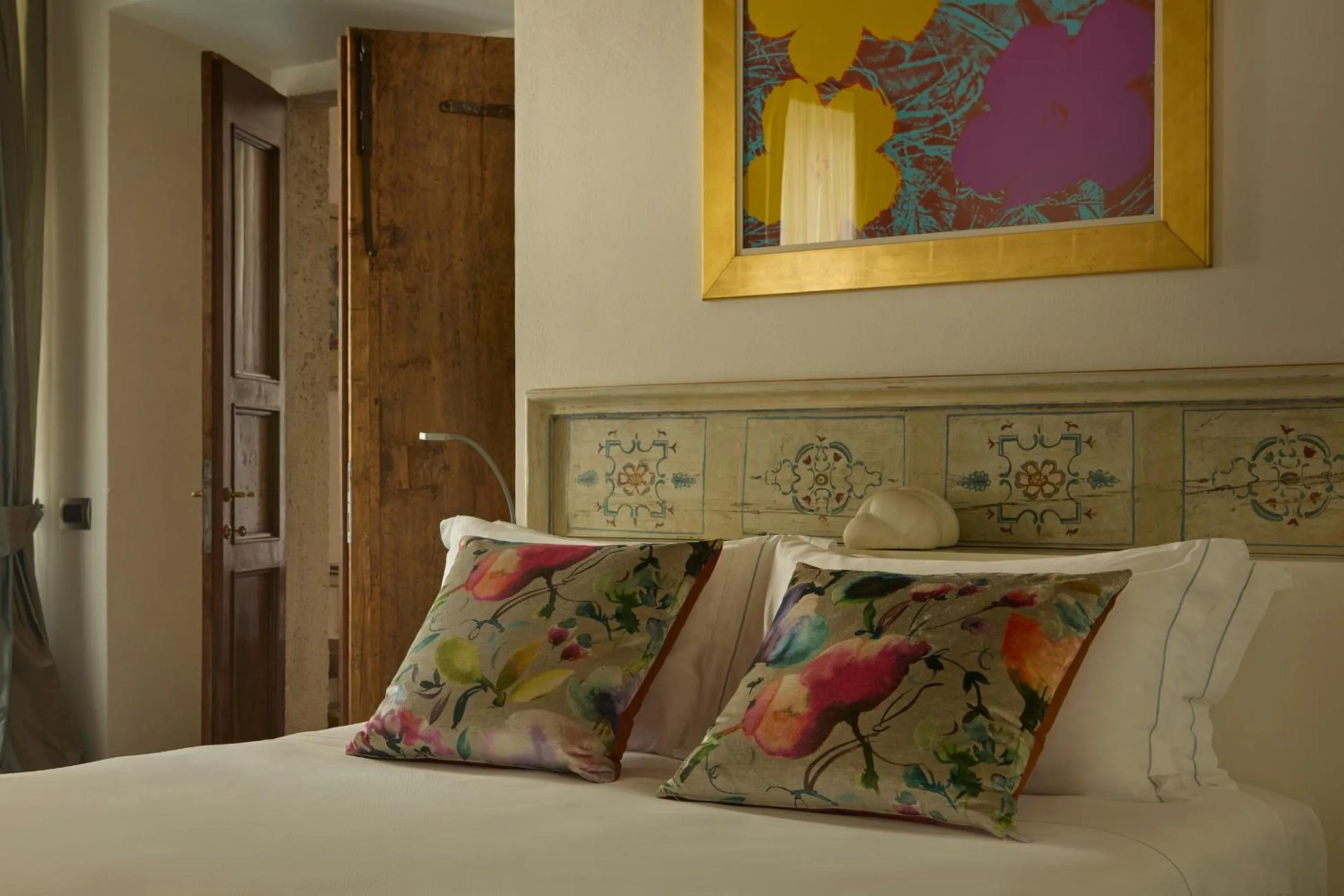 Bed in Palazzo Delle Pietre - Luxury Apartments