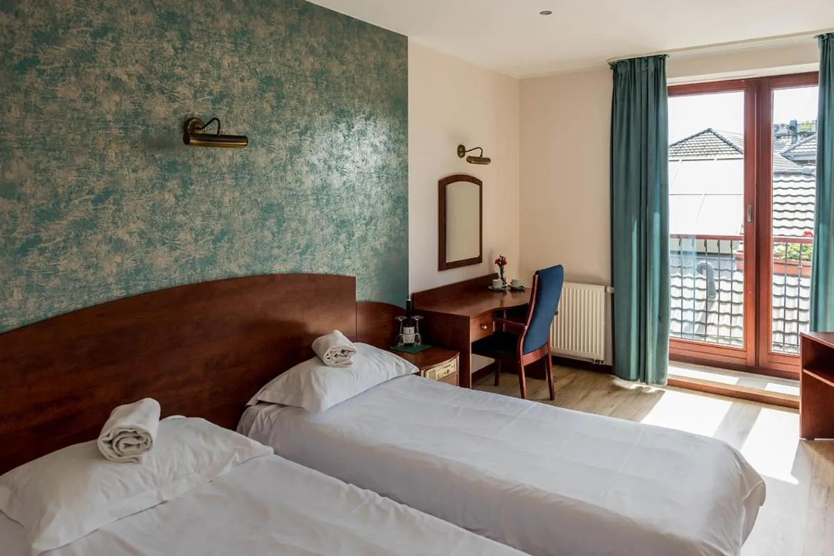 Bed in 4 Pory Roku Resort Sauna & Spa