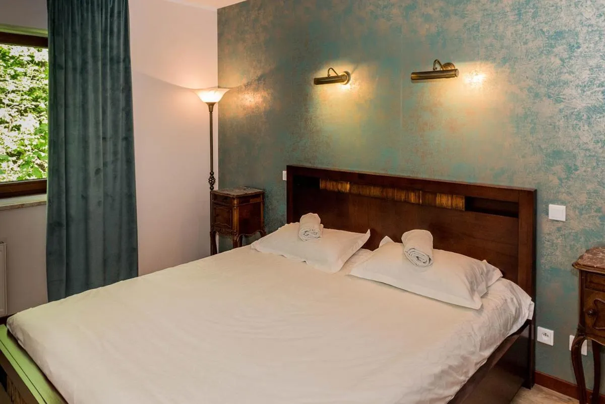 Bed in 4 Pory Roku Resort Sauna & Spa