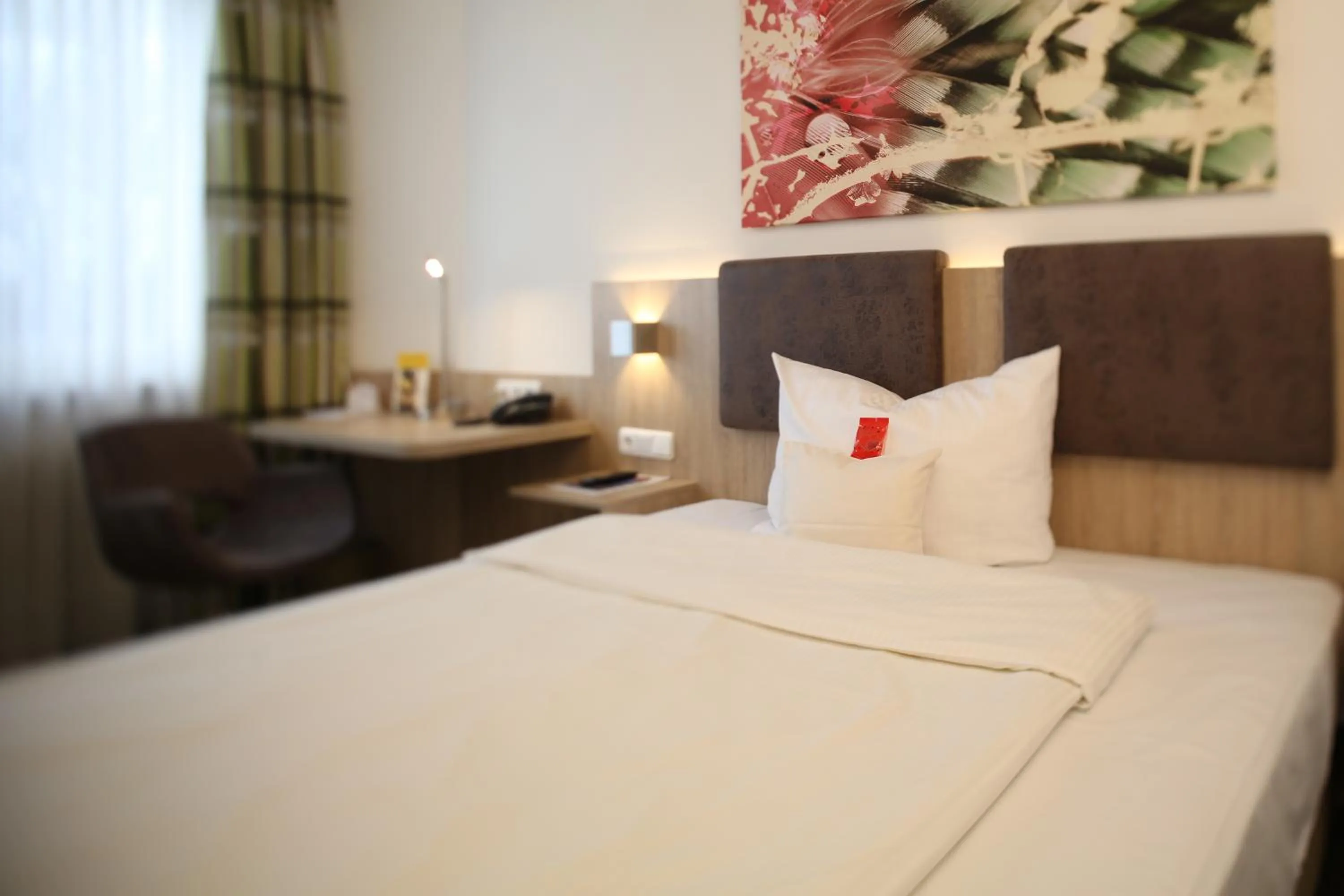 Photo of the whole room, Bed in Central Hotel Eschborn