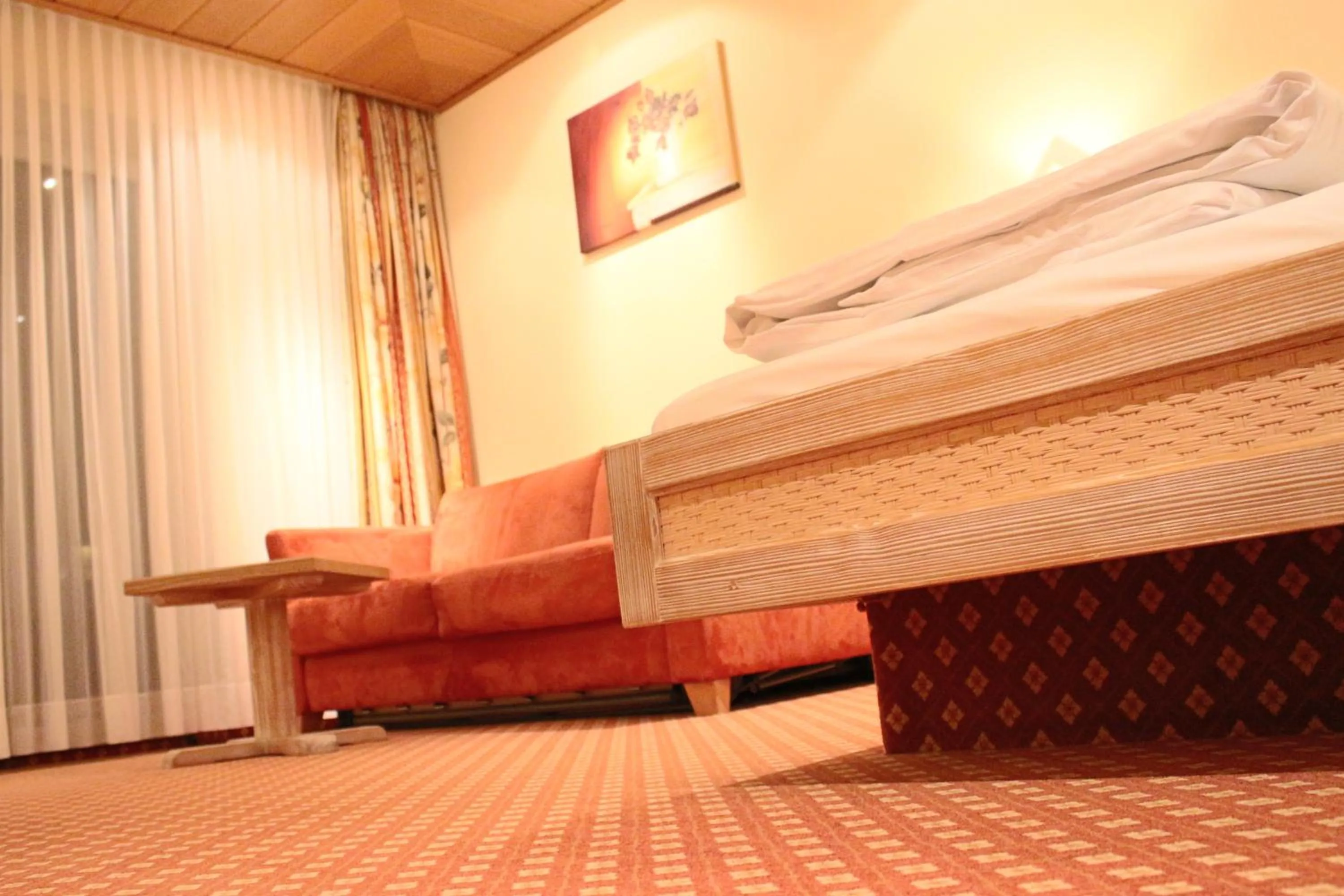 Seating area, Bed in Central-Hotel