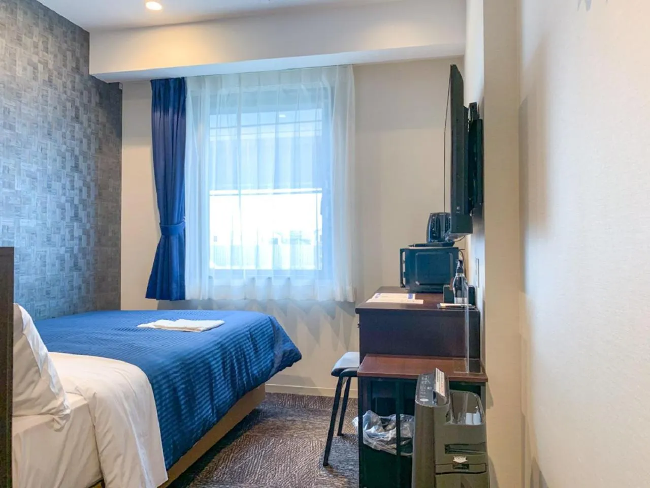 Bed in HOTEL LiVEMAX Nishinomiya