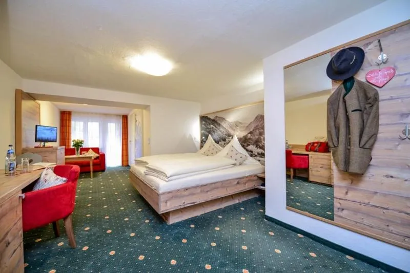 Photo of the whole room, Bed in Sonnenbichl Hotel am Rotfischbach