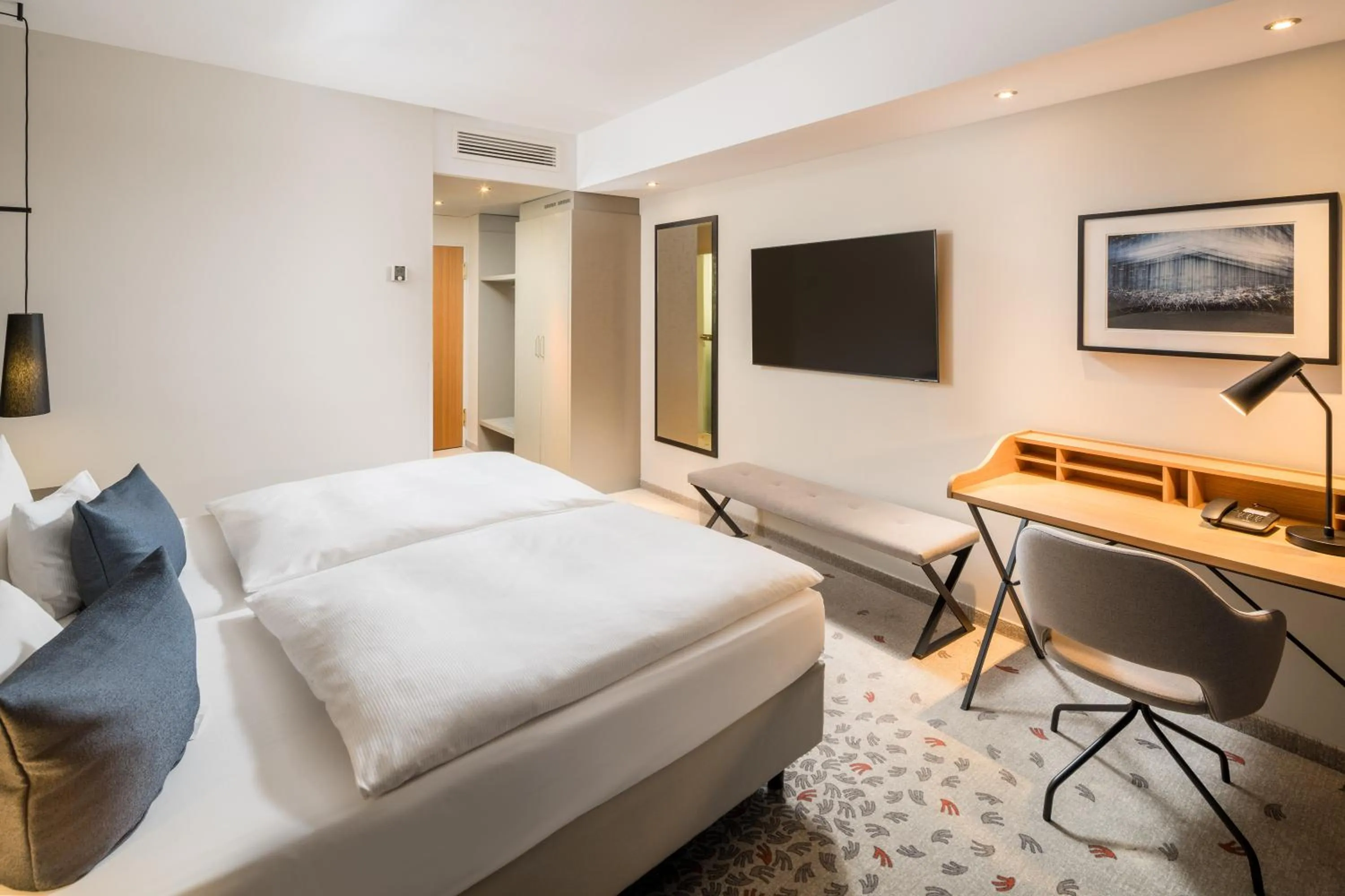 Bed in Steigenberger Hotel Bielefelder Hof