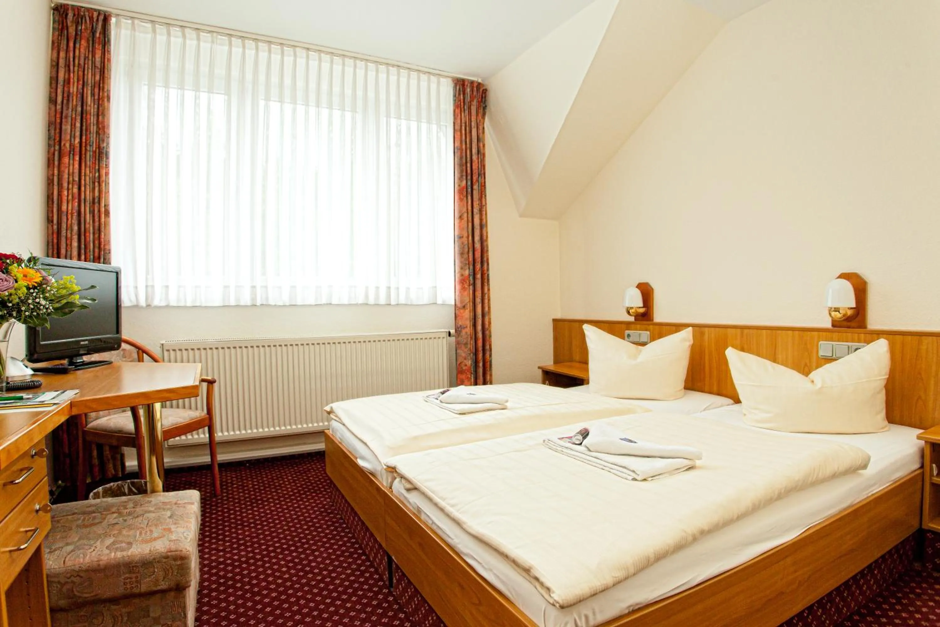 Bedroom, Bed in WAGNERS Sporthotel Oberhof