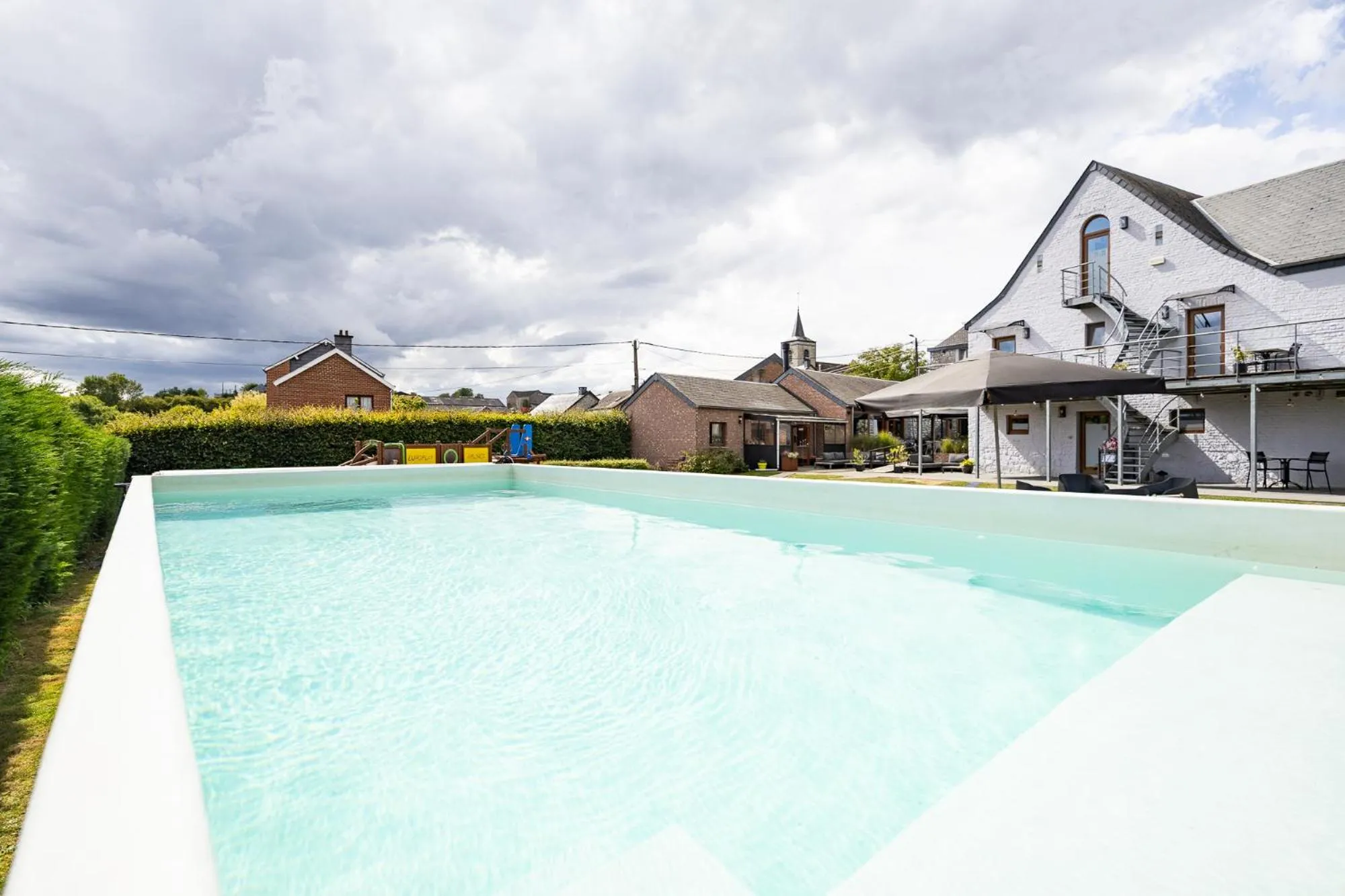 Swimming pool in Hotel & Restaurant Maison Pal'Ange