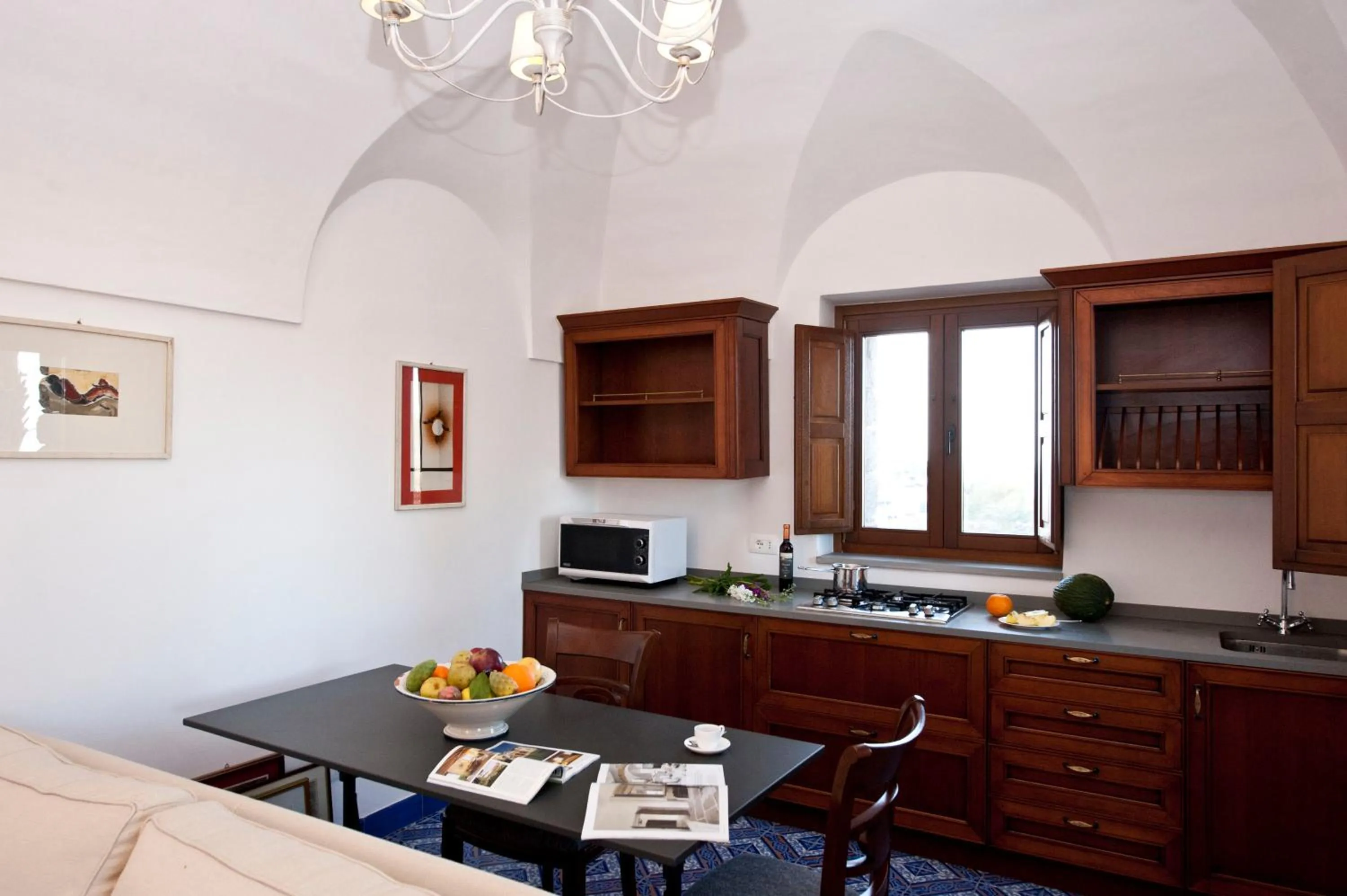 Kitchen or kitchenette in Resort Acropoli