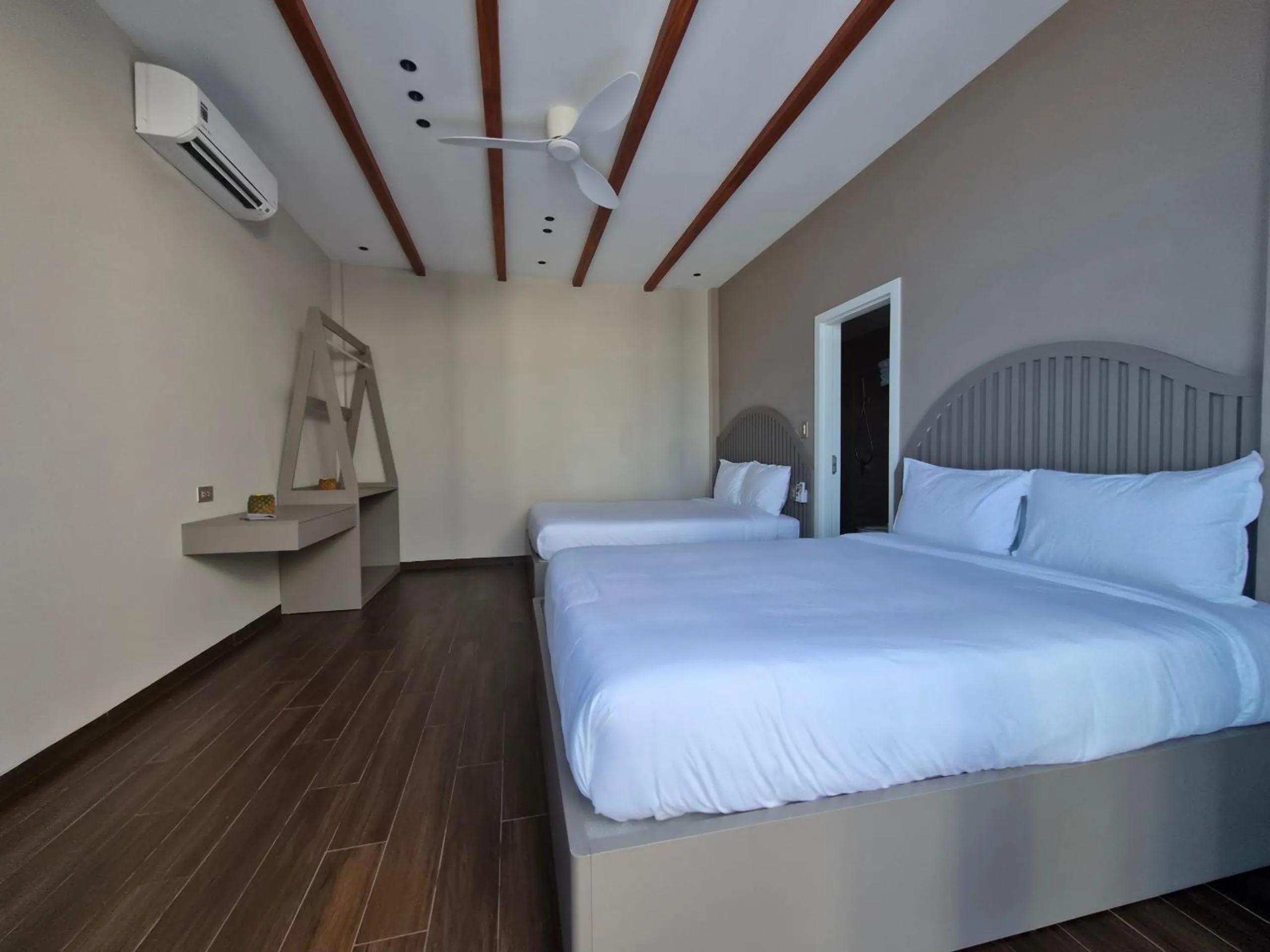 Bed in Chai Village Hotel