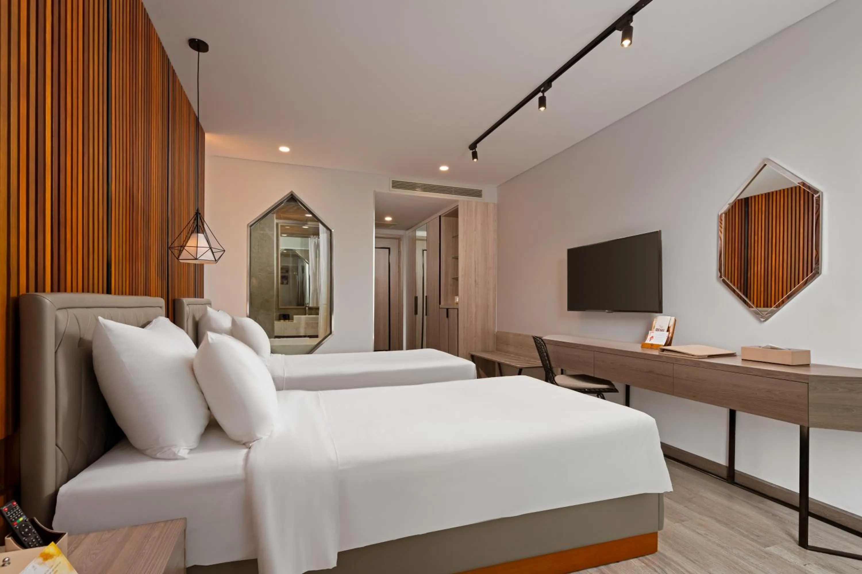 Bed in HAIAN Riverfront Hotel Da Nang