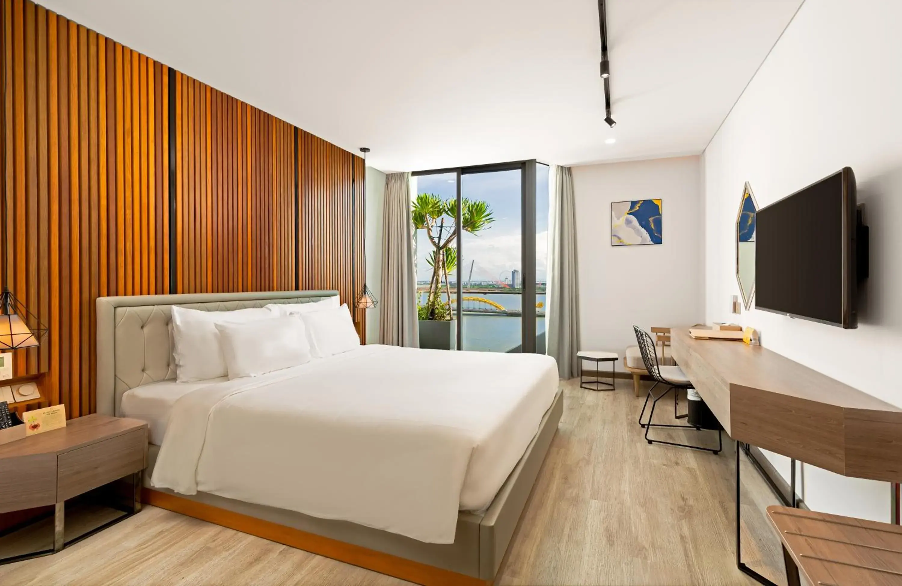 View (from property/room), Bed in HAIAN Riverfront Hotel Da Nang View (from property/room), Bed in HAIAN Riverfront Hotel Da Nang