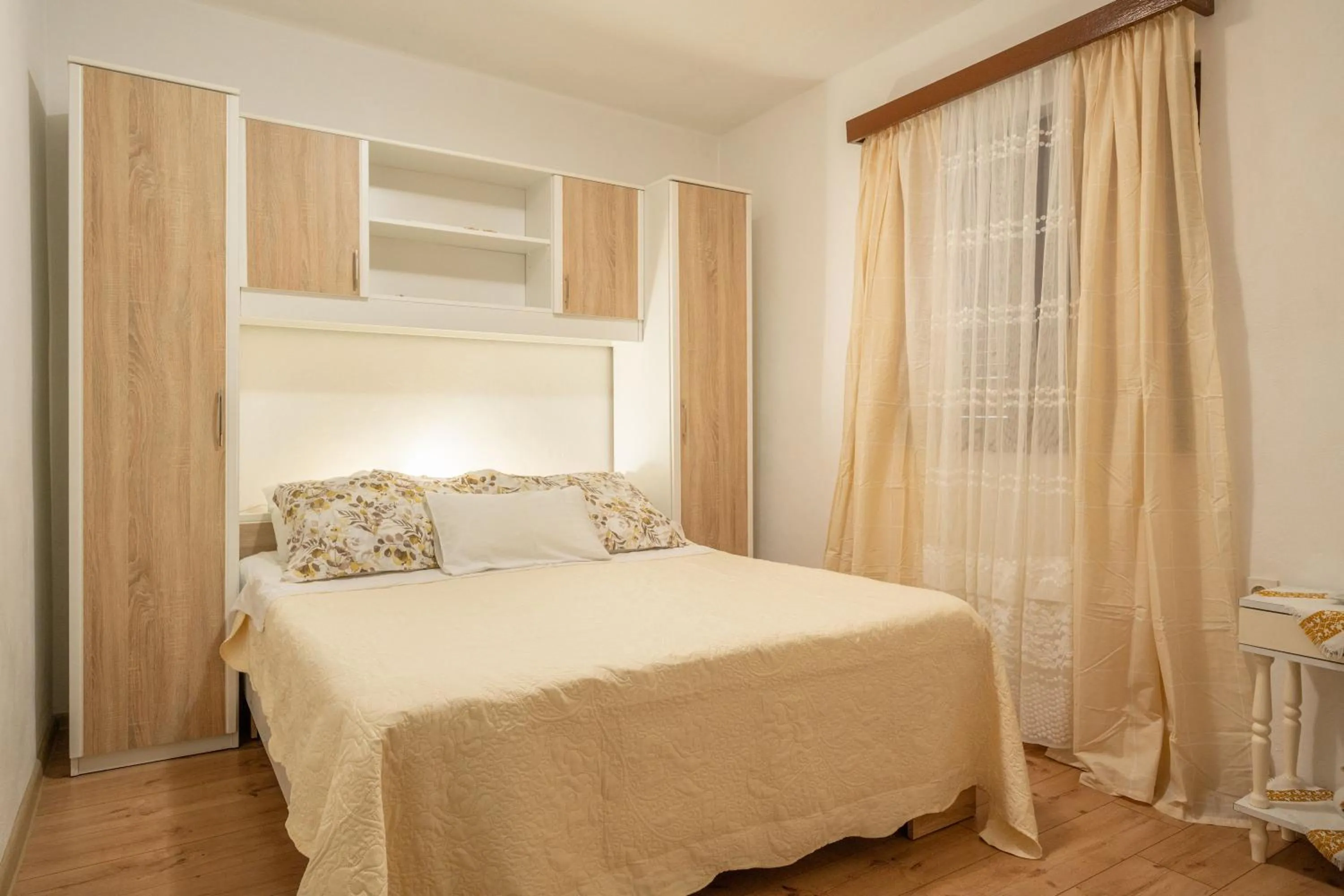 Bed in Apartments Ljiljana