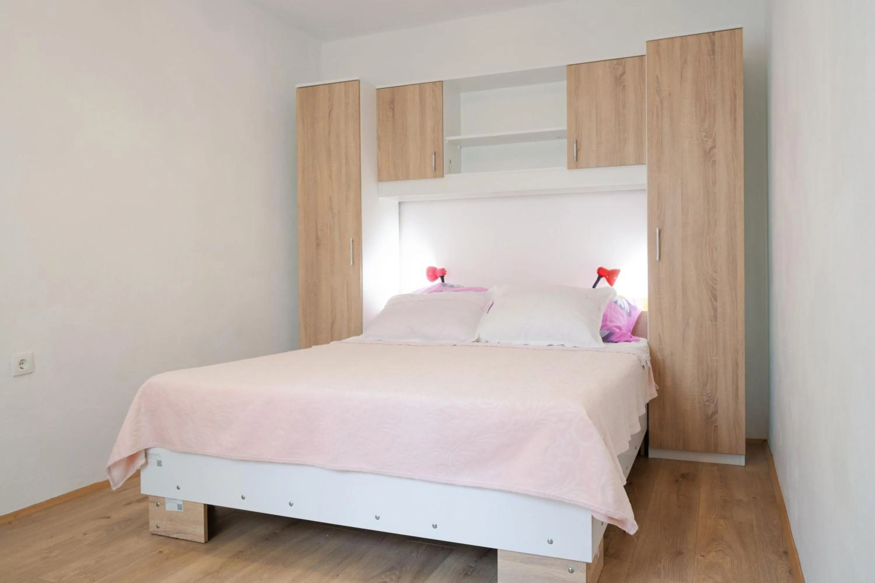 Bed in Apartments Ljiljana