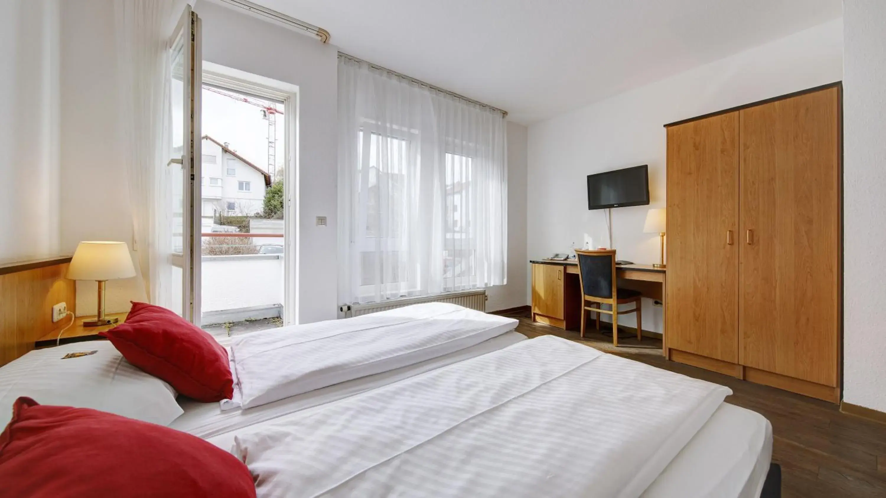 Photo of the whole room, Bed in Airport-Hotel Stetten
