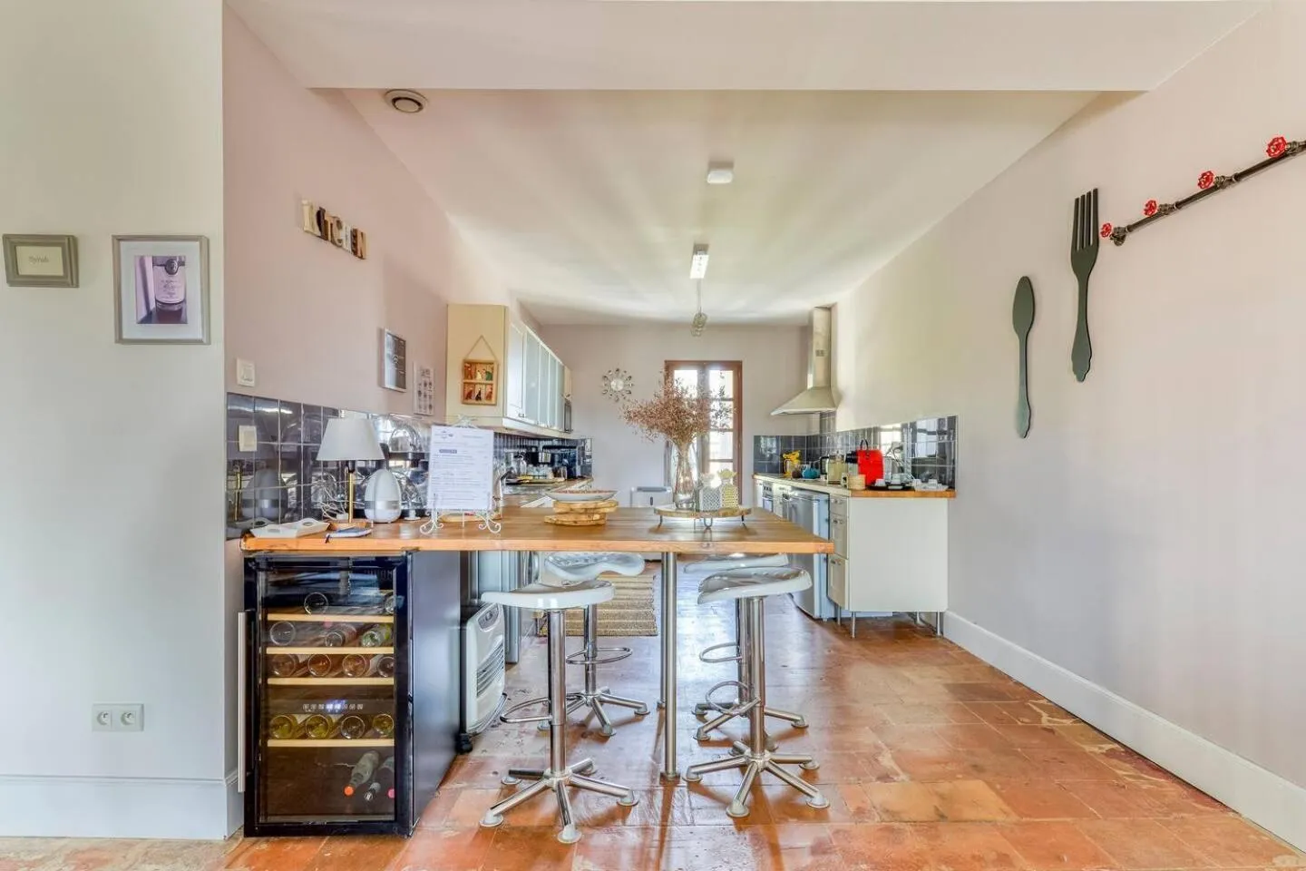 Kitchen or kitchenette in Maison Dix Chambres d'hôtes et Espace SPA Bien être