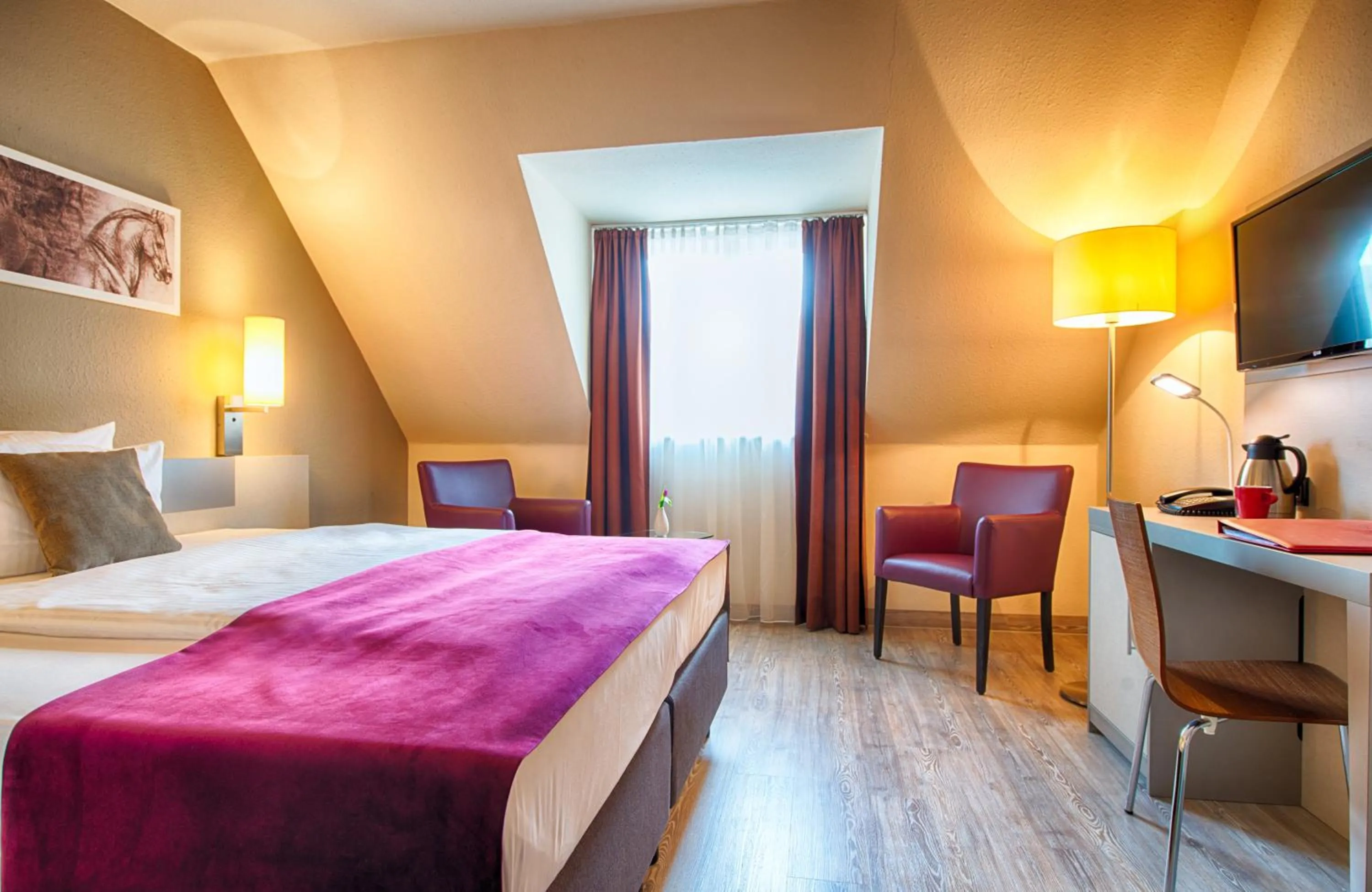 Photo of the whole room, Bed in Leonardo Hotel Mannheim-Ladenburg