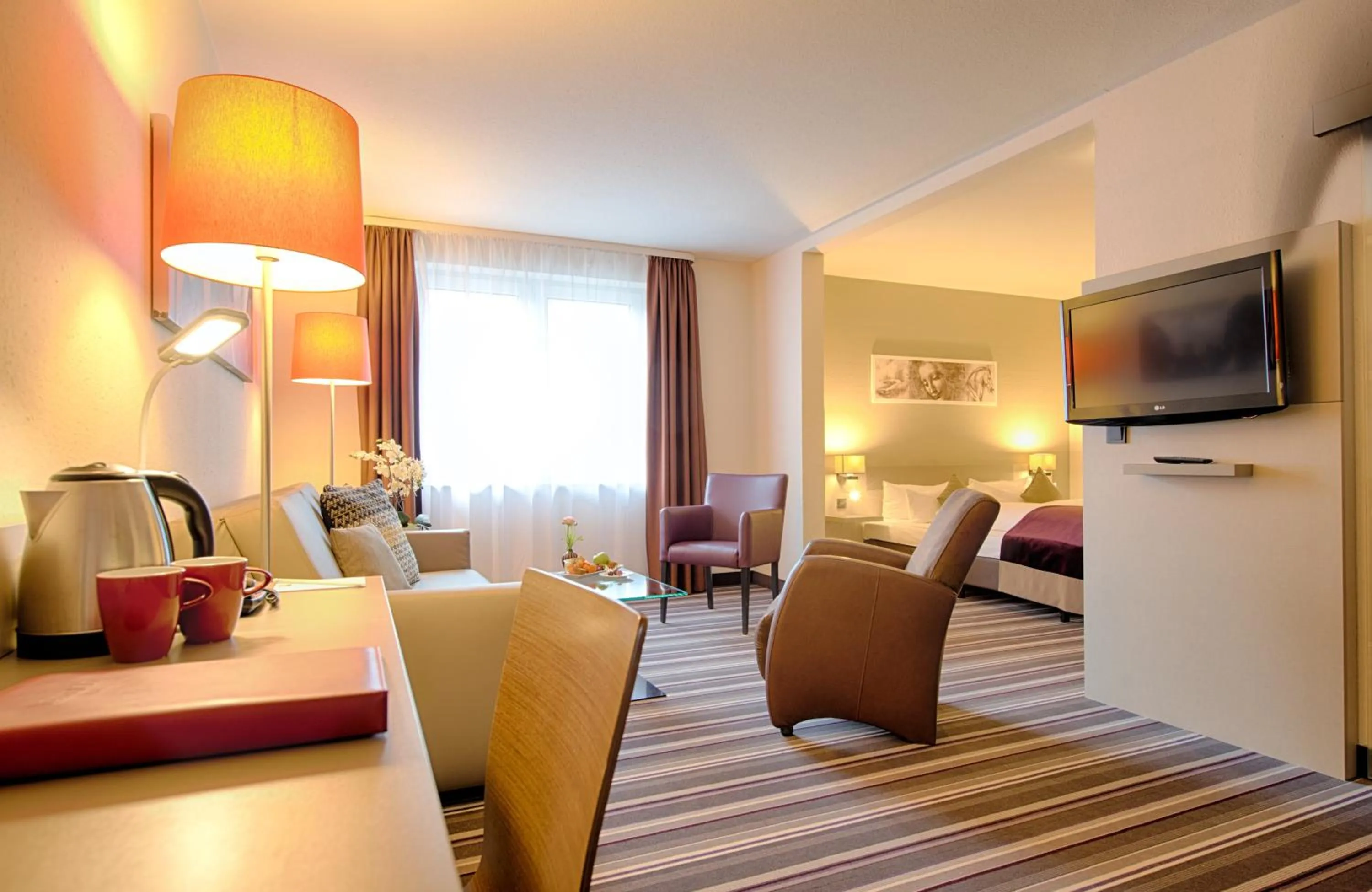 Photo of the whole room, Bed in Leonardo Hotel Mannheim-Ladenburg