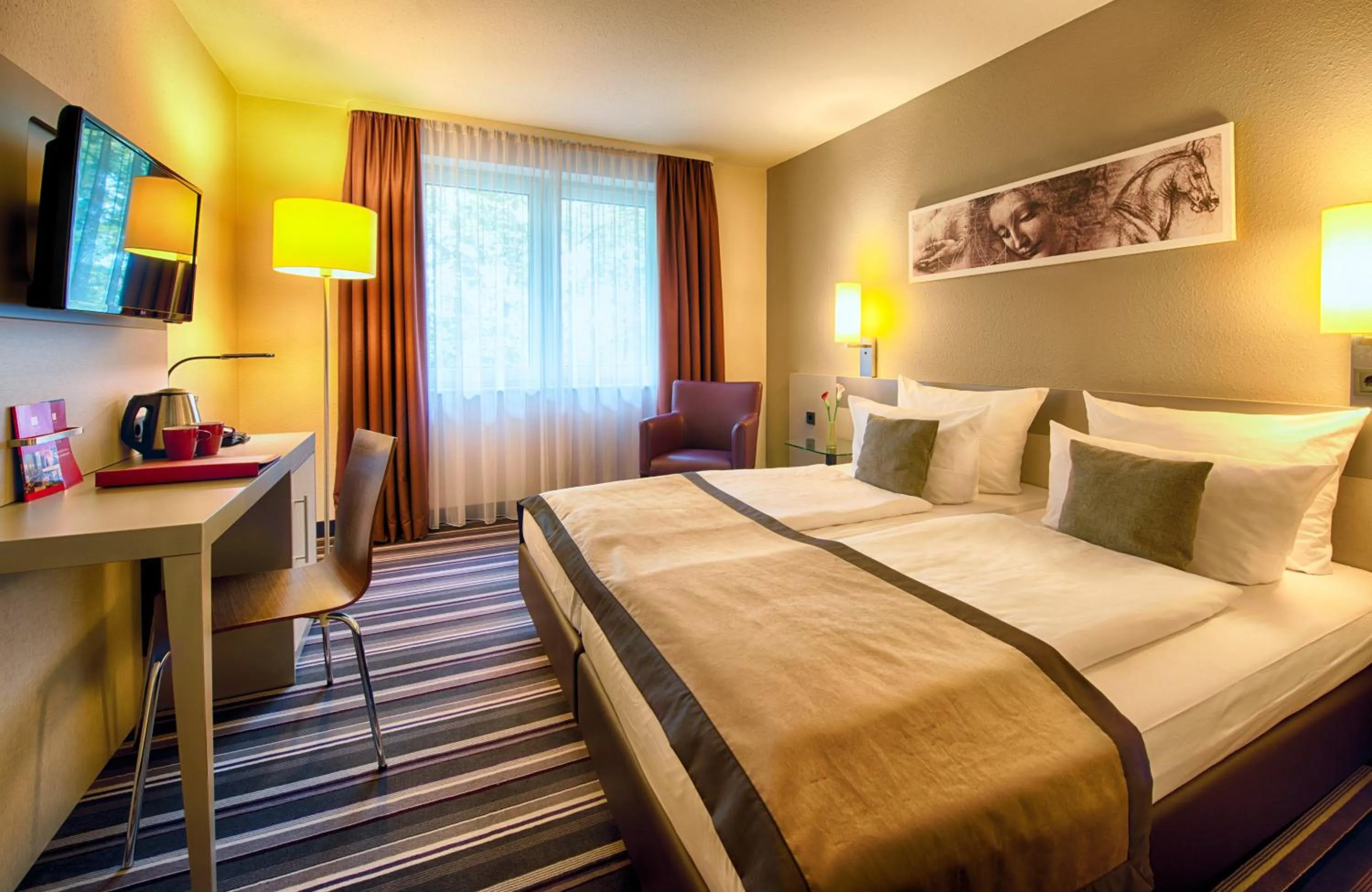 Photo of the whole room, Bed in Leonardo Hotel Mannheim-Ladenburg
