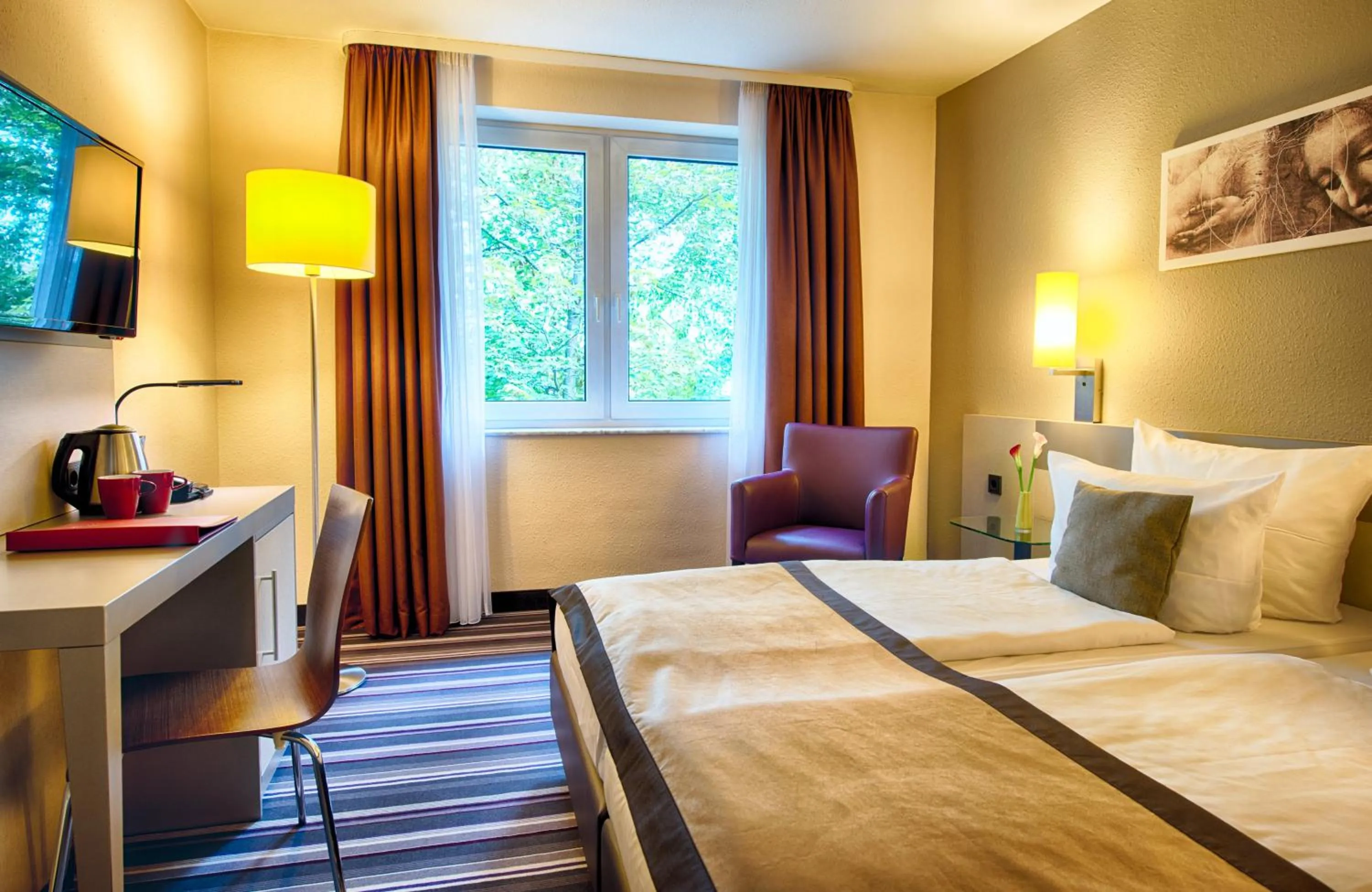 Photo of the whole room, Bed in Leonardo Hotel Mannheim-Ladenburg