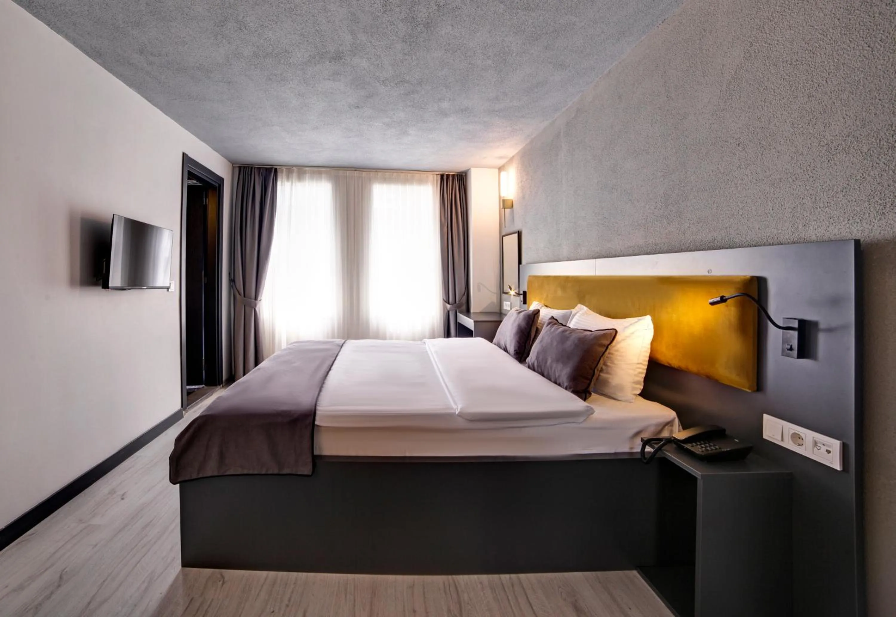 Bed in Taksim Seya Suites Hotel