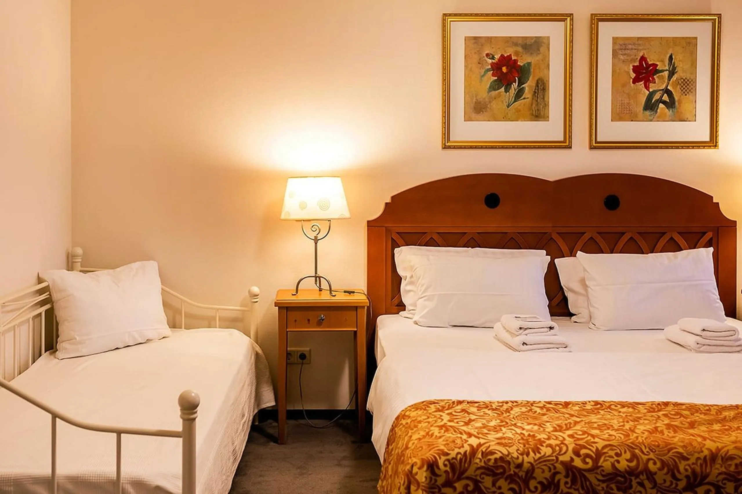 Bed in Apparthotel Bad Schandau by STEIGER Hotels