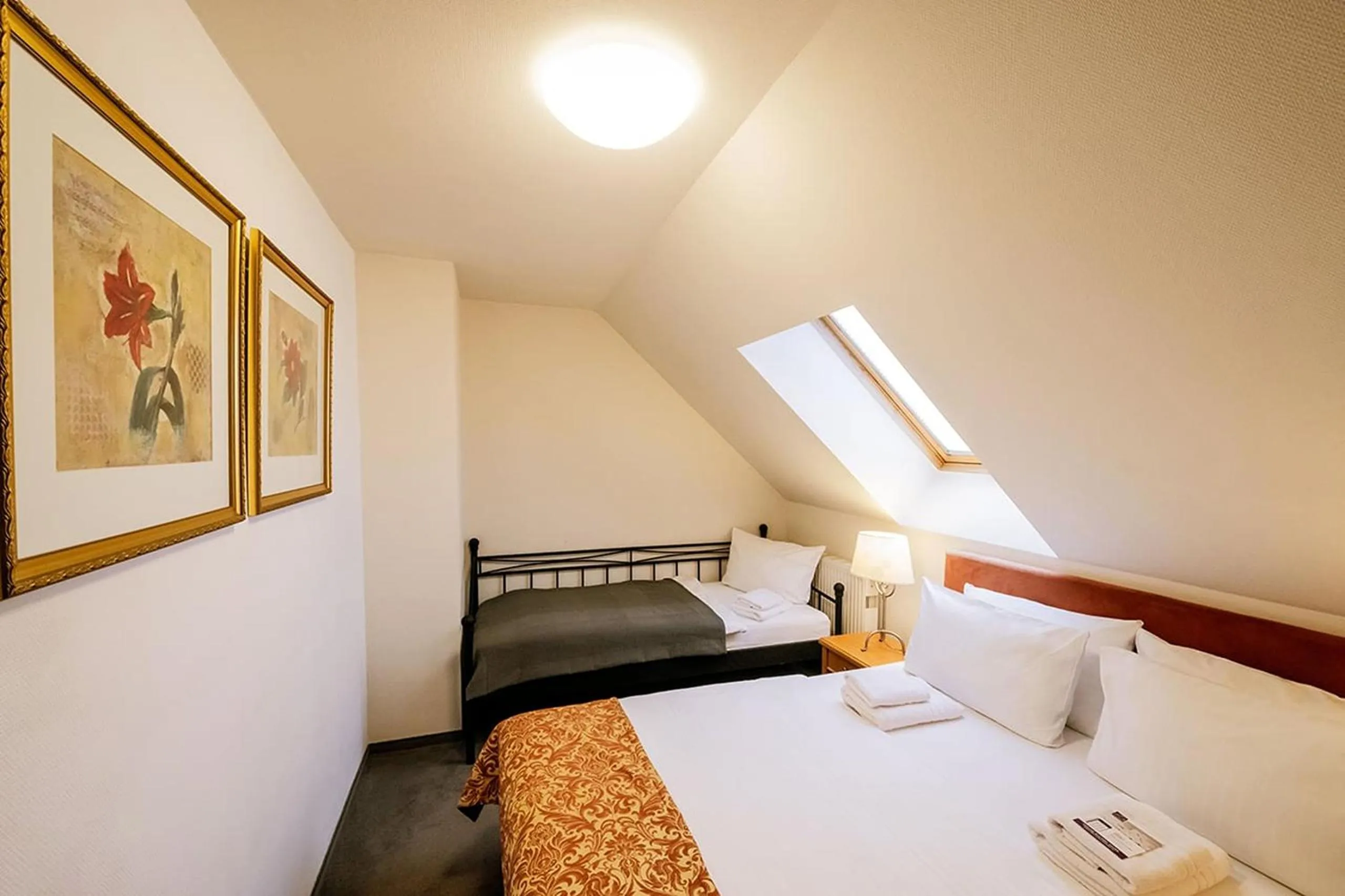 Bedroom, Bed in Apparthotel Bad Schandau by STEIGER Hotels