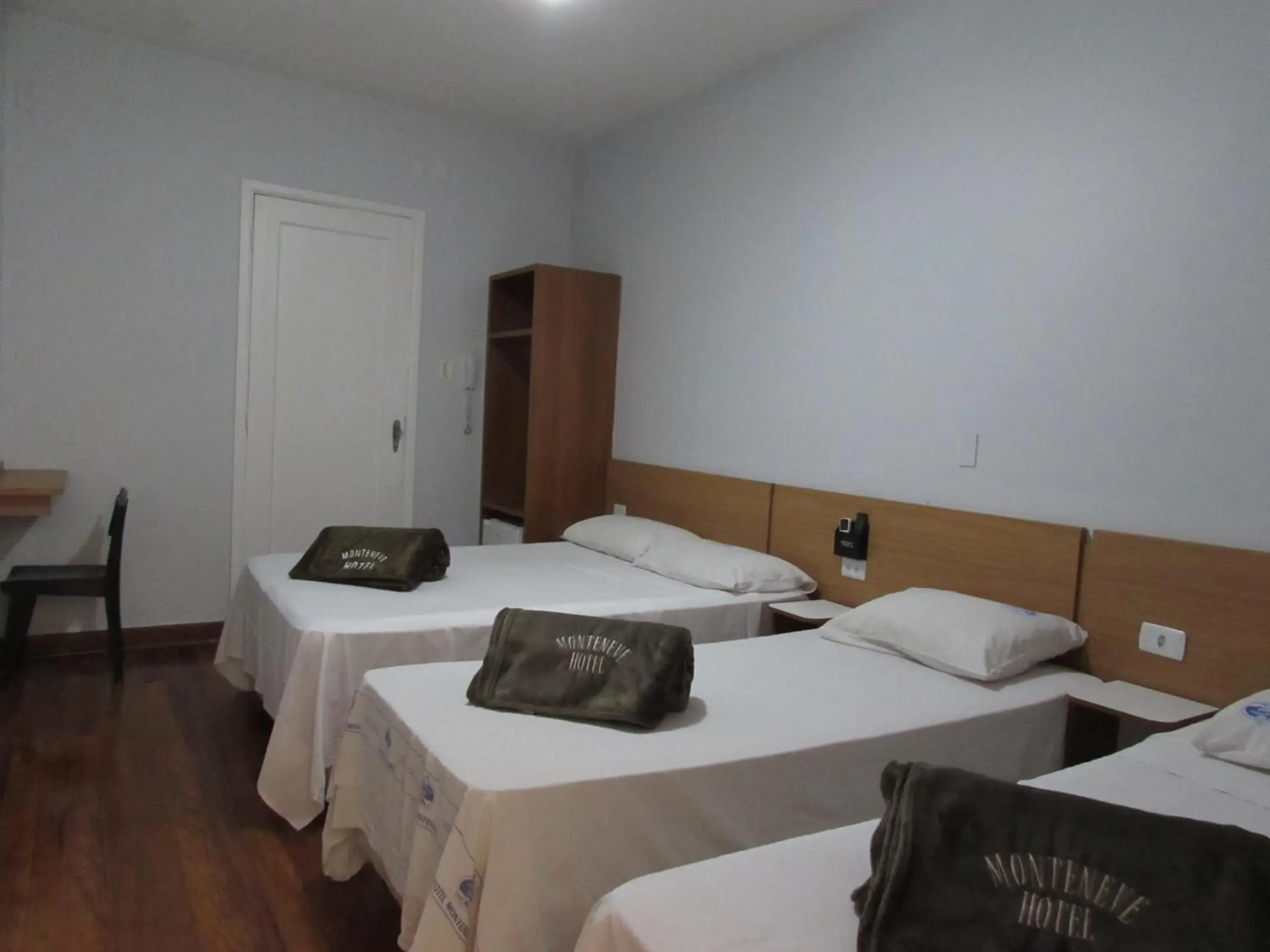 Quadruple Room - single occupancy in Hotel Monteneve Quadruple Room - single occupancy in Hotel Monteneve